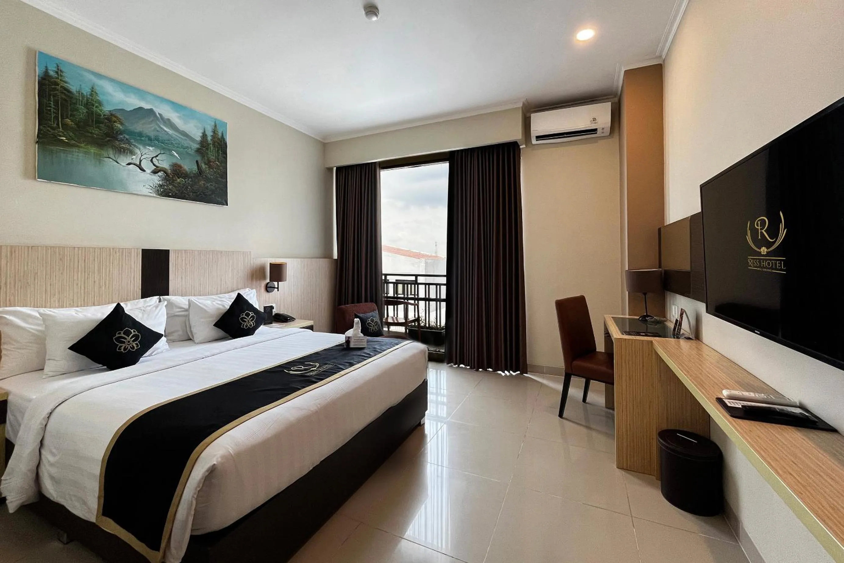 Bed in Riss Hotel Malioboro