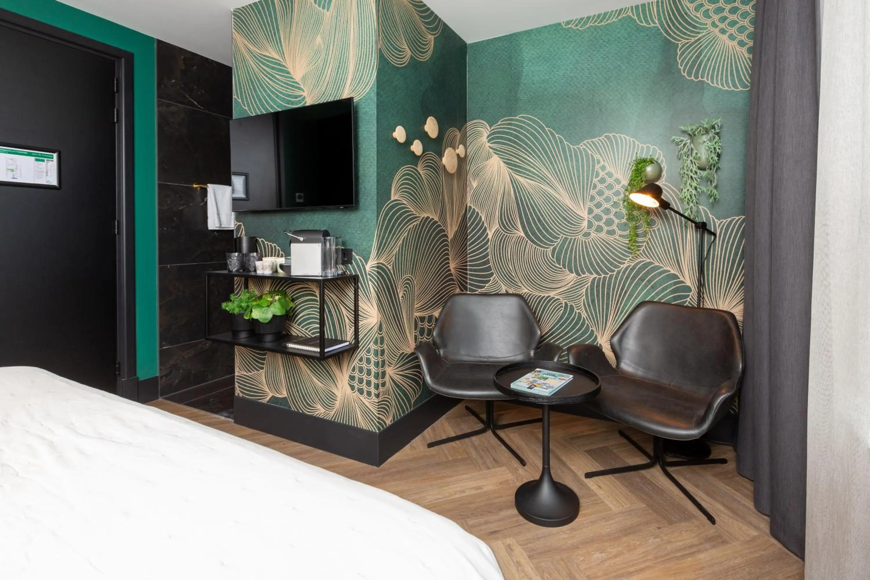 Seating area, Bed in Boutiquehotel Princenjagt