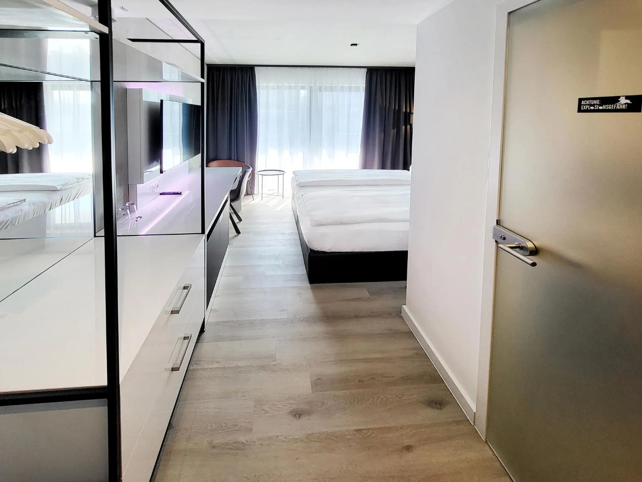 Photo of the whole room, Bed in DORMERO Hotel Aschaffenburg