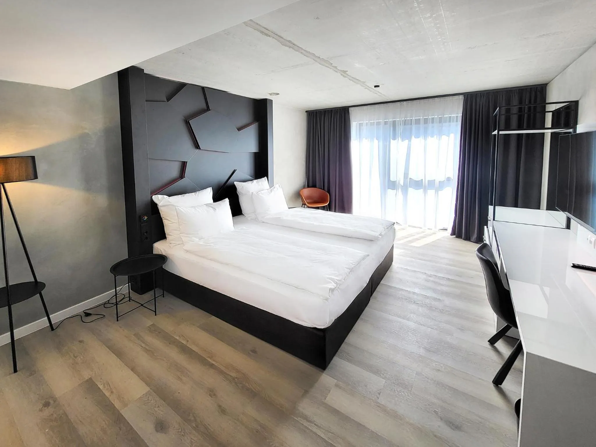 Photo of the whole room, Bed in DORMERO Hotel Aschaffenburg