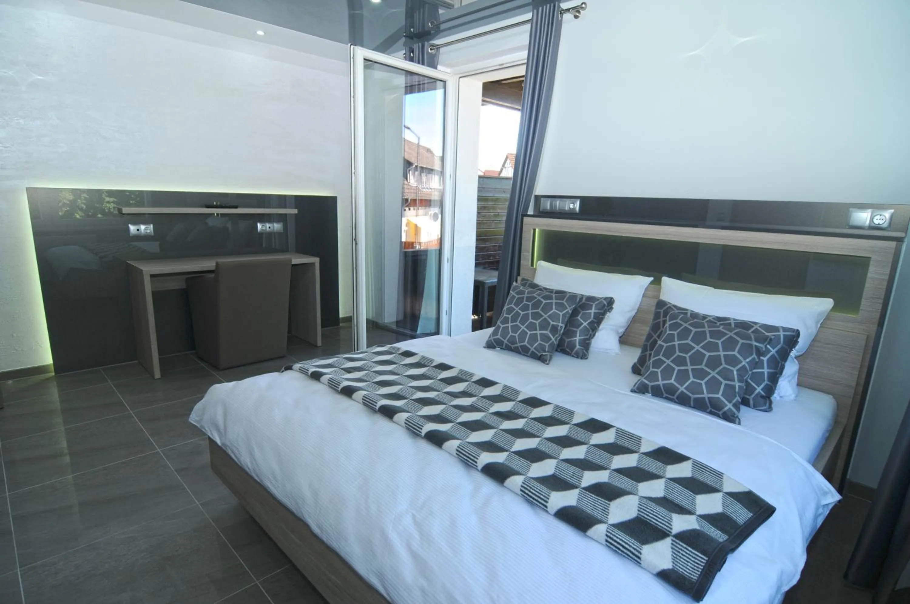 Bed in Nanis Hotel & Appartements