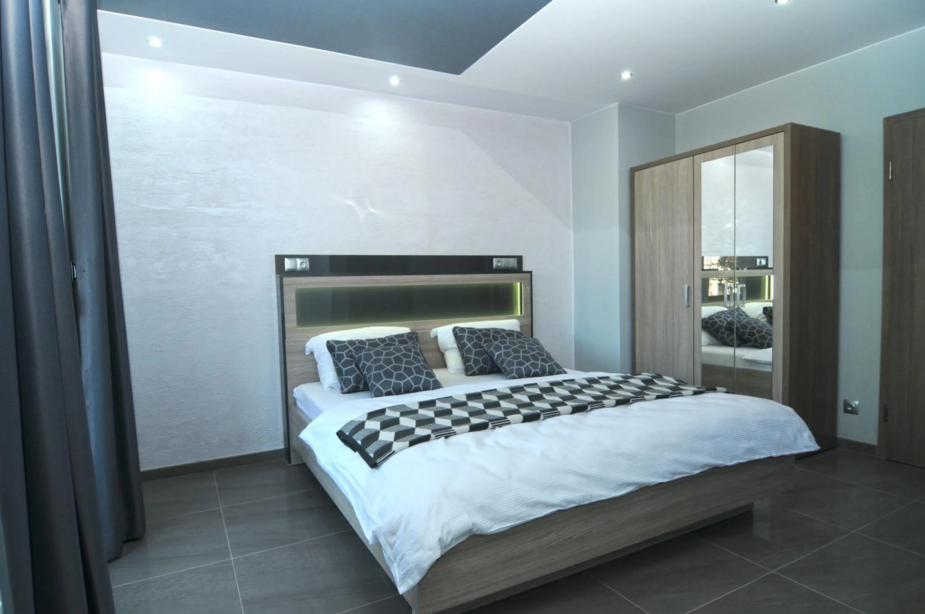 Bed in Nanis Hotel & Appartements