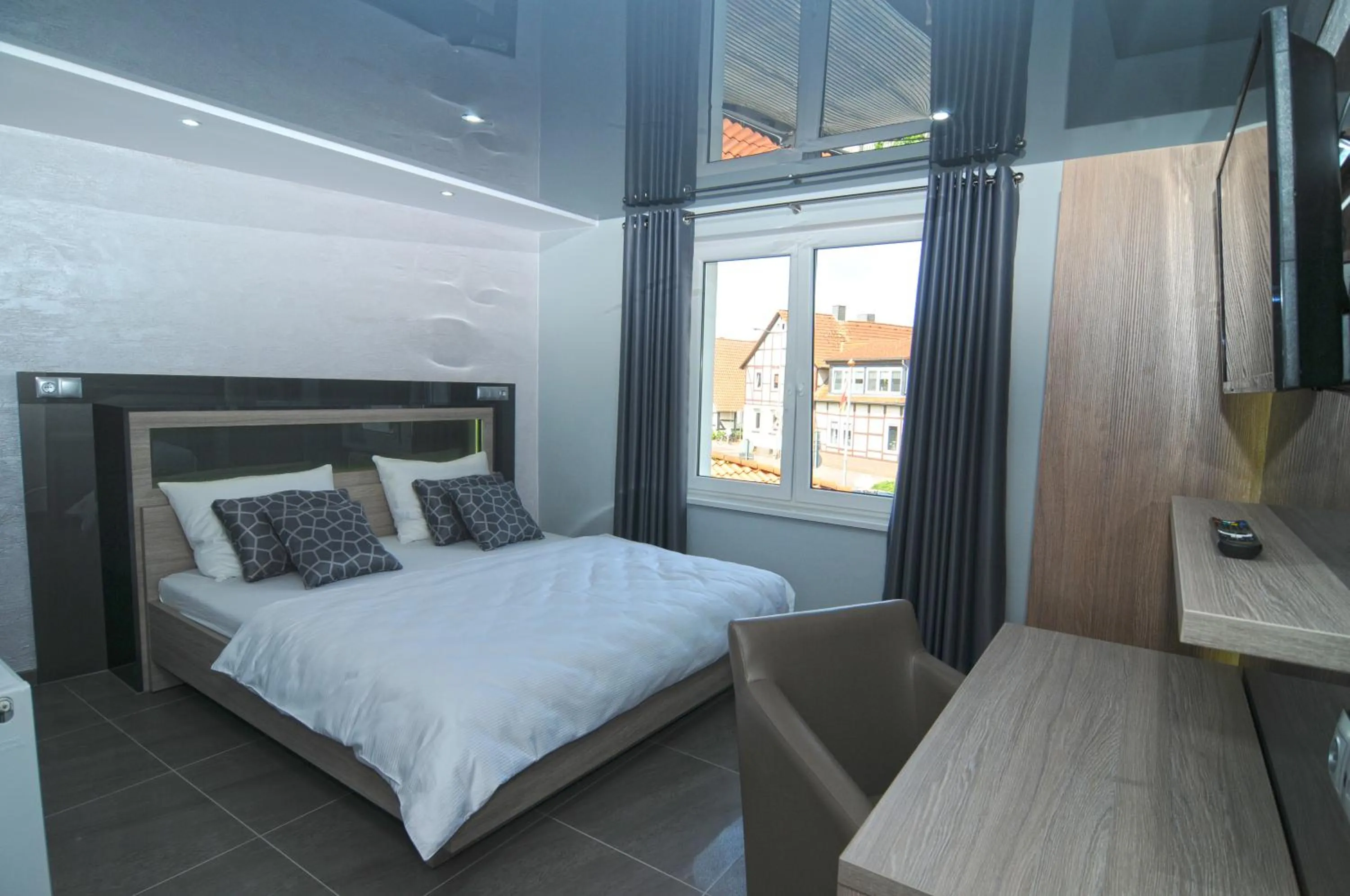 Bed in Nanis Hotel & Appartements