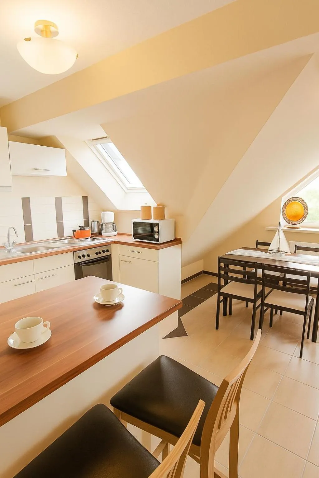 Kitchen or kitchenette in Nanis Hotel & Appartements