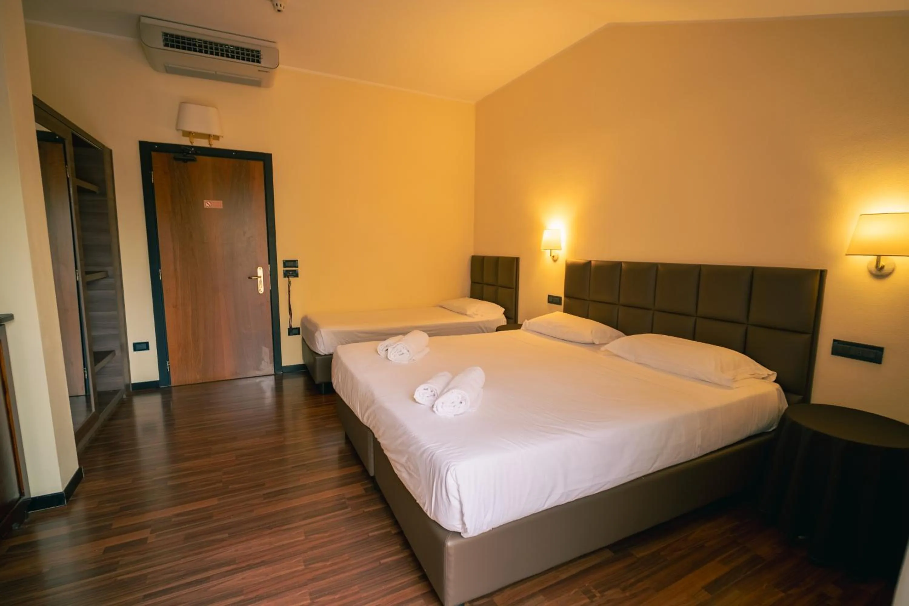 Bed in Yachting Hotel Mistral