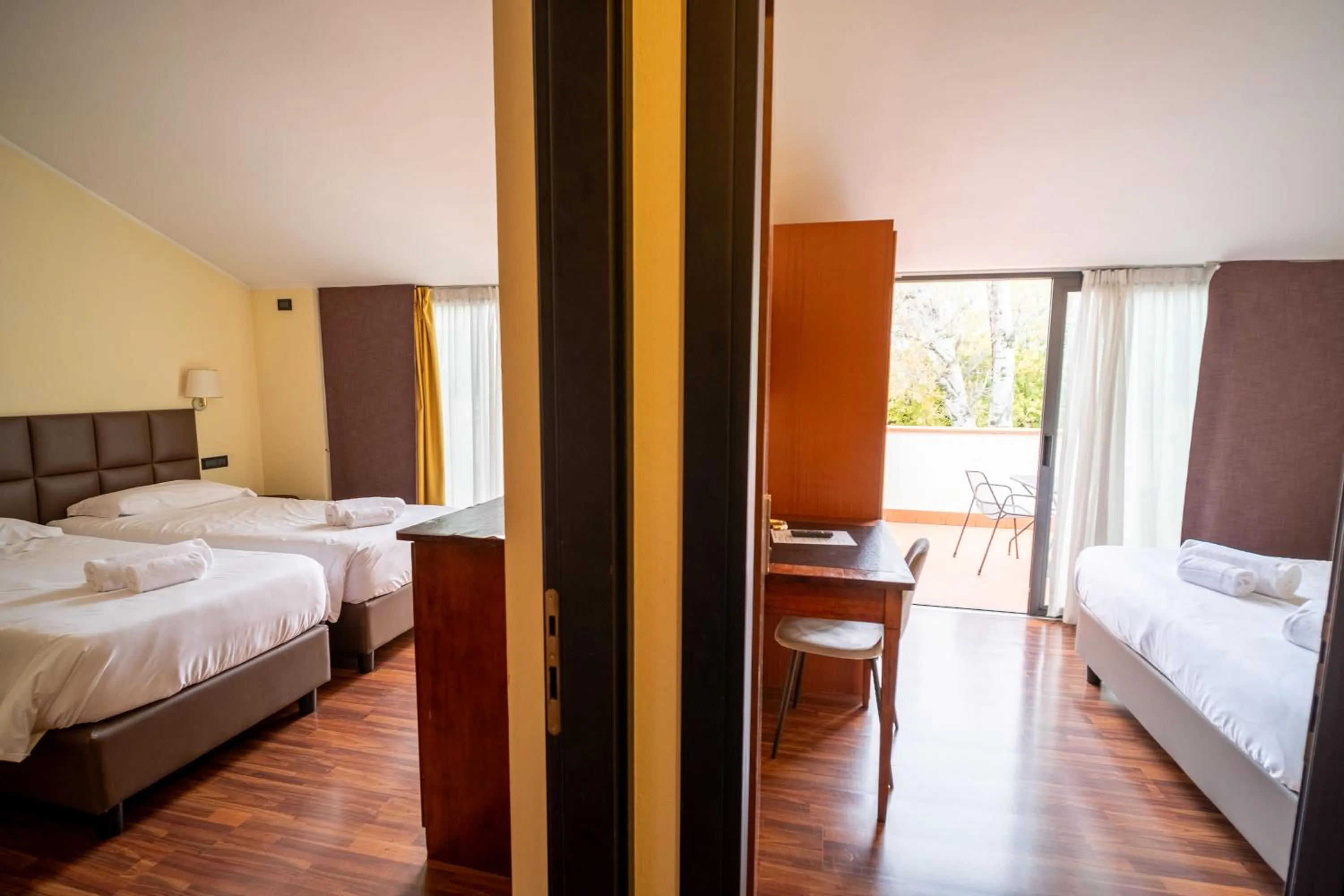 Bed in Yachting Hotel Mistral