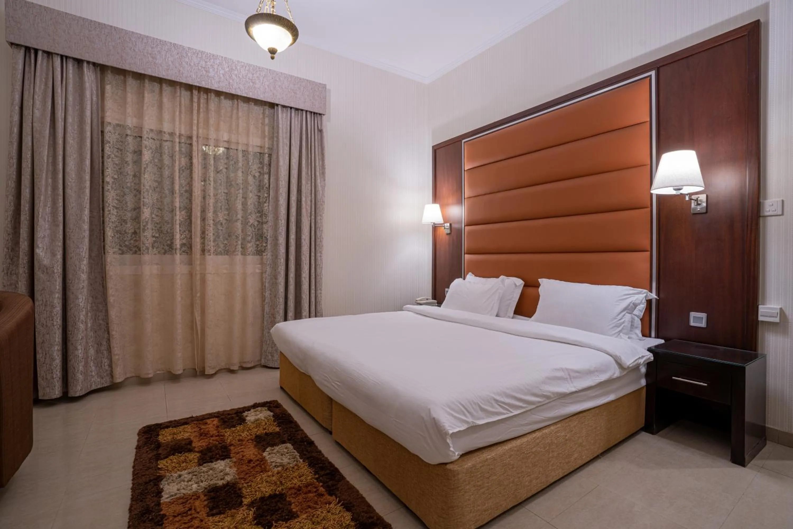 Bed in Vista City Hotel