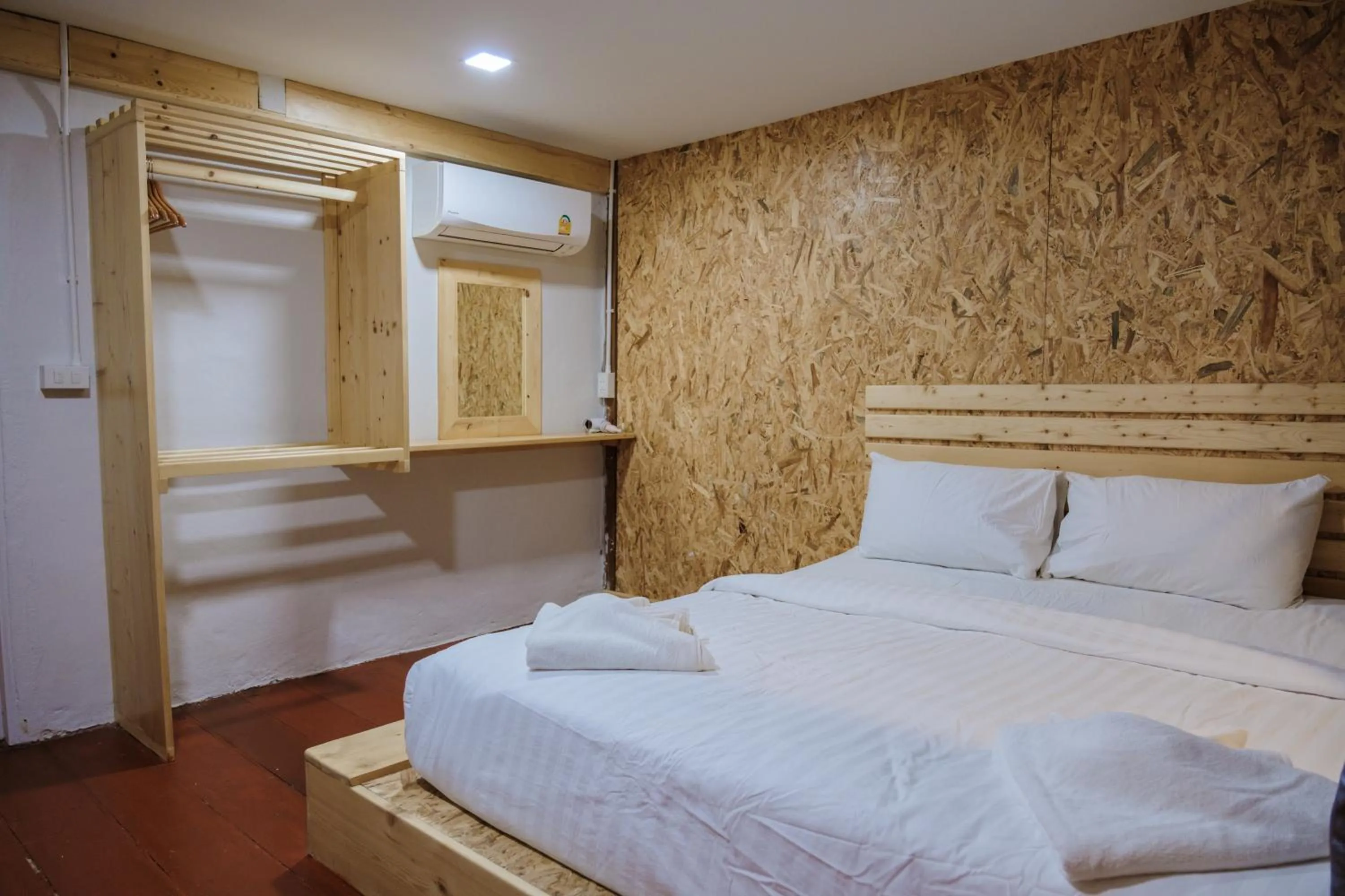 Bed in Lipe Garden Beach Resort