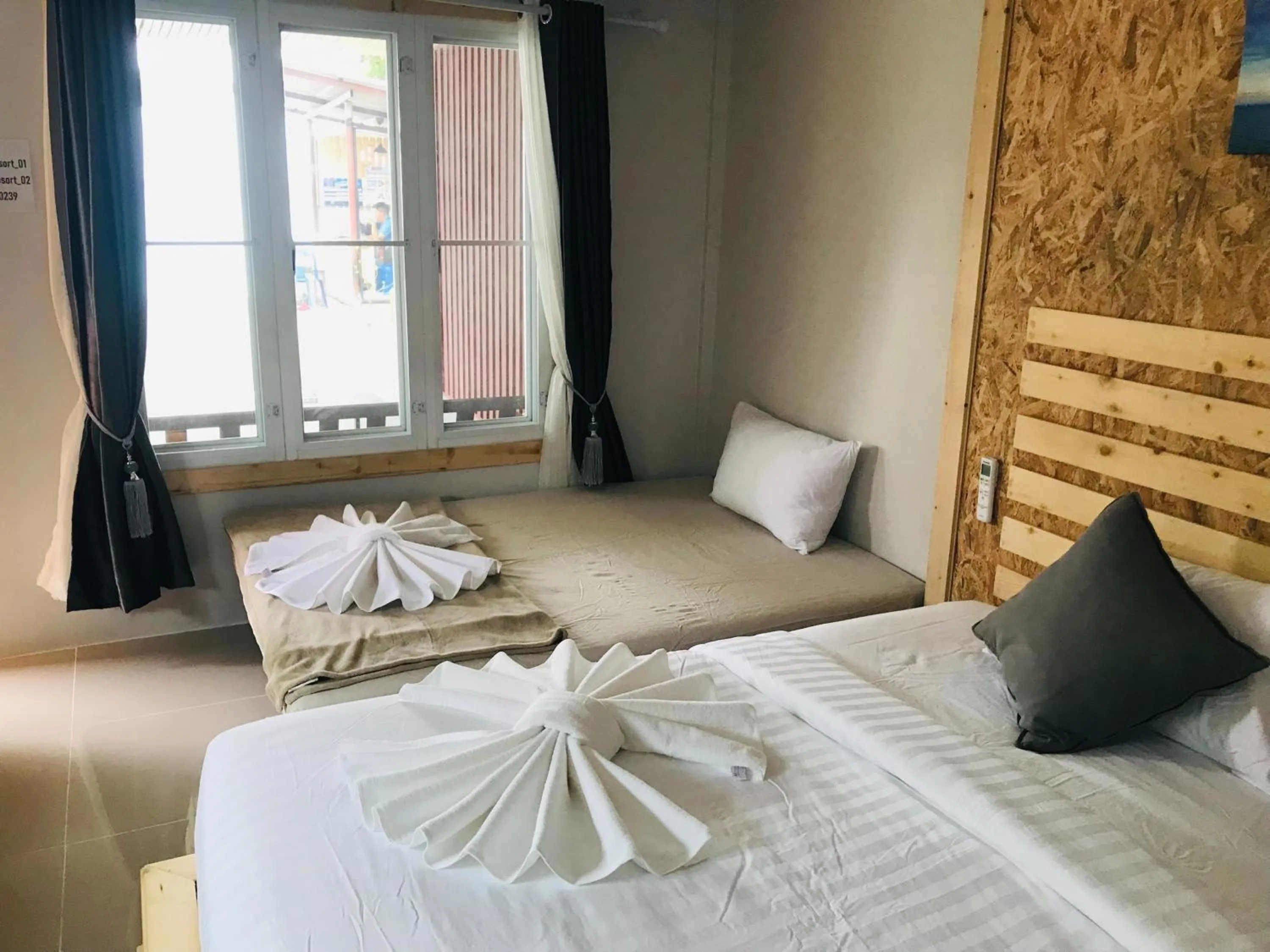 Bed in Lipe Garden Beach Resort