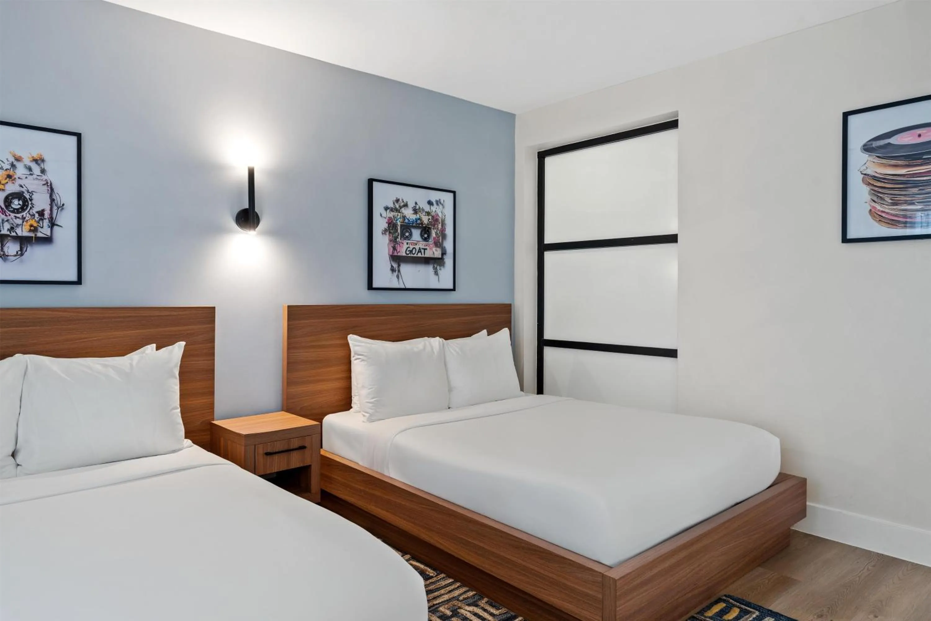 Bed in The Lum Hotel Los Angeles Stadium District