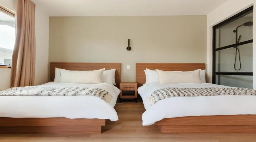 Bedroom, Bed in The Lum Hotel Los Angeles Stadium District