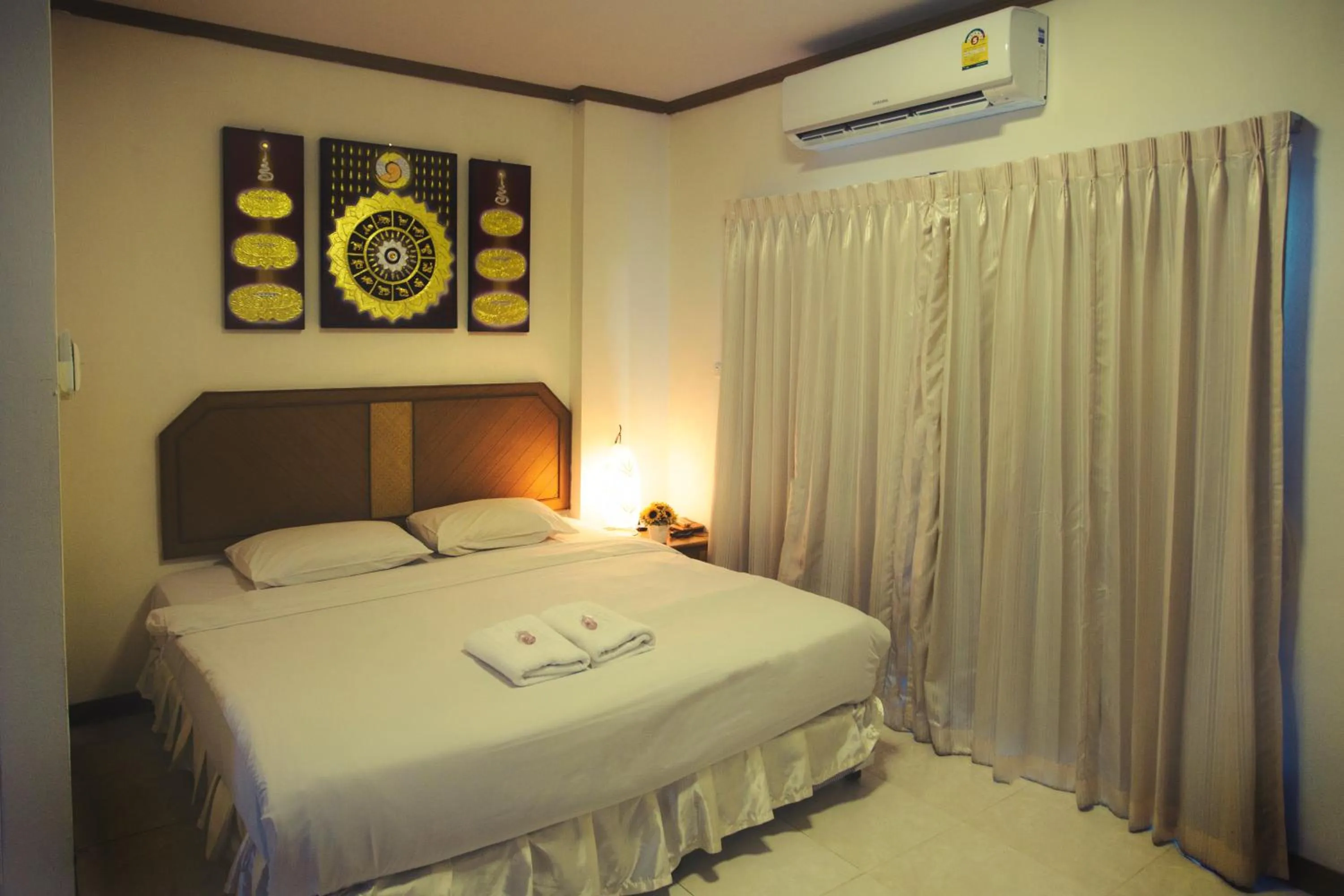 Bed in The Residence Hotel -SHA Extra Plus