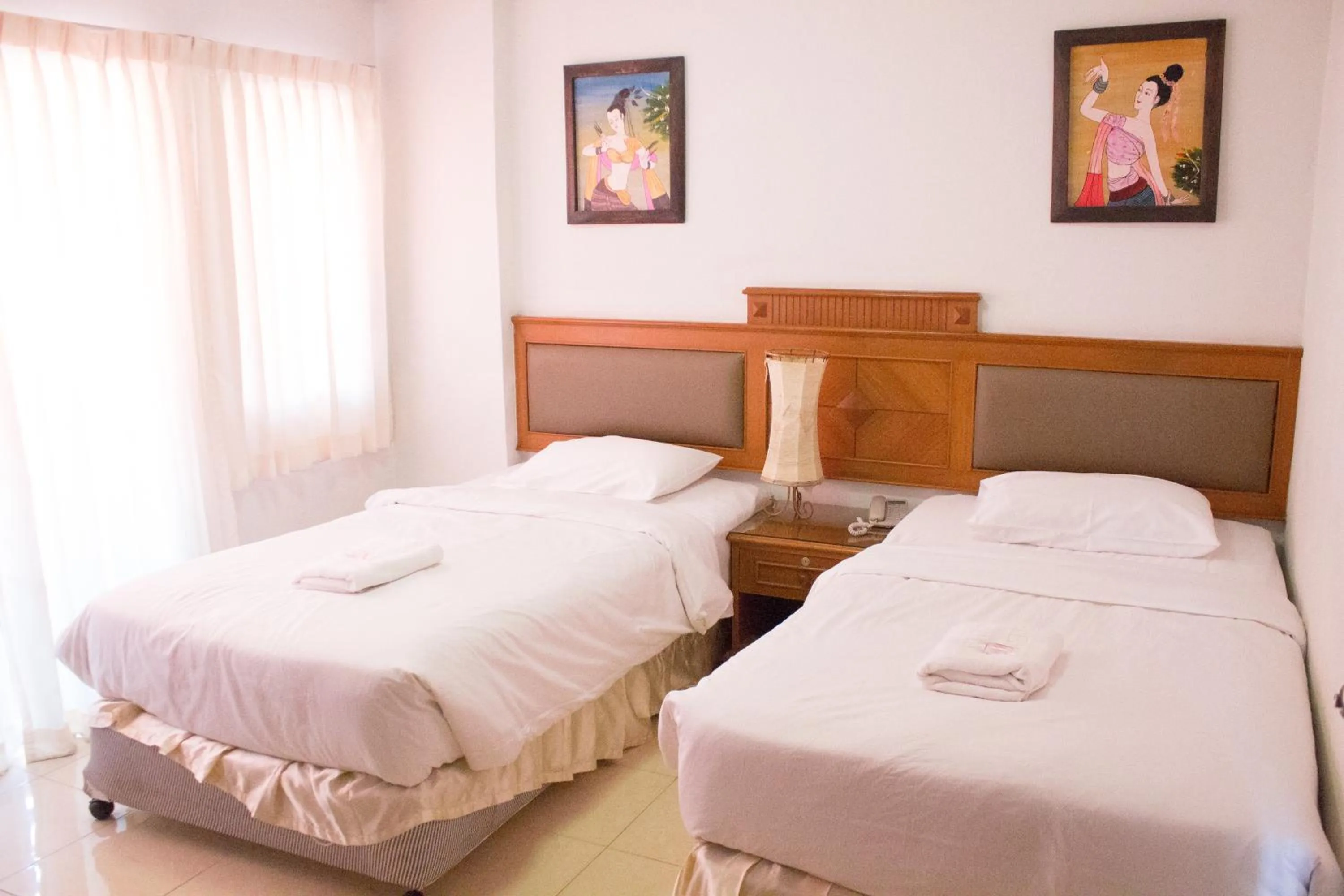 Bed in The Residence Hotel -SHA Extra Plus