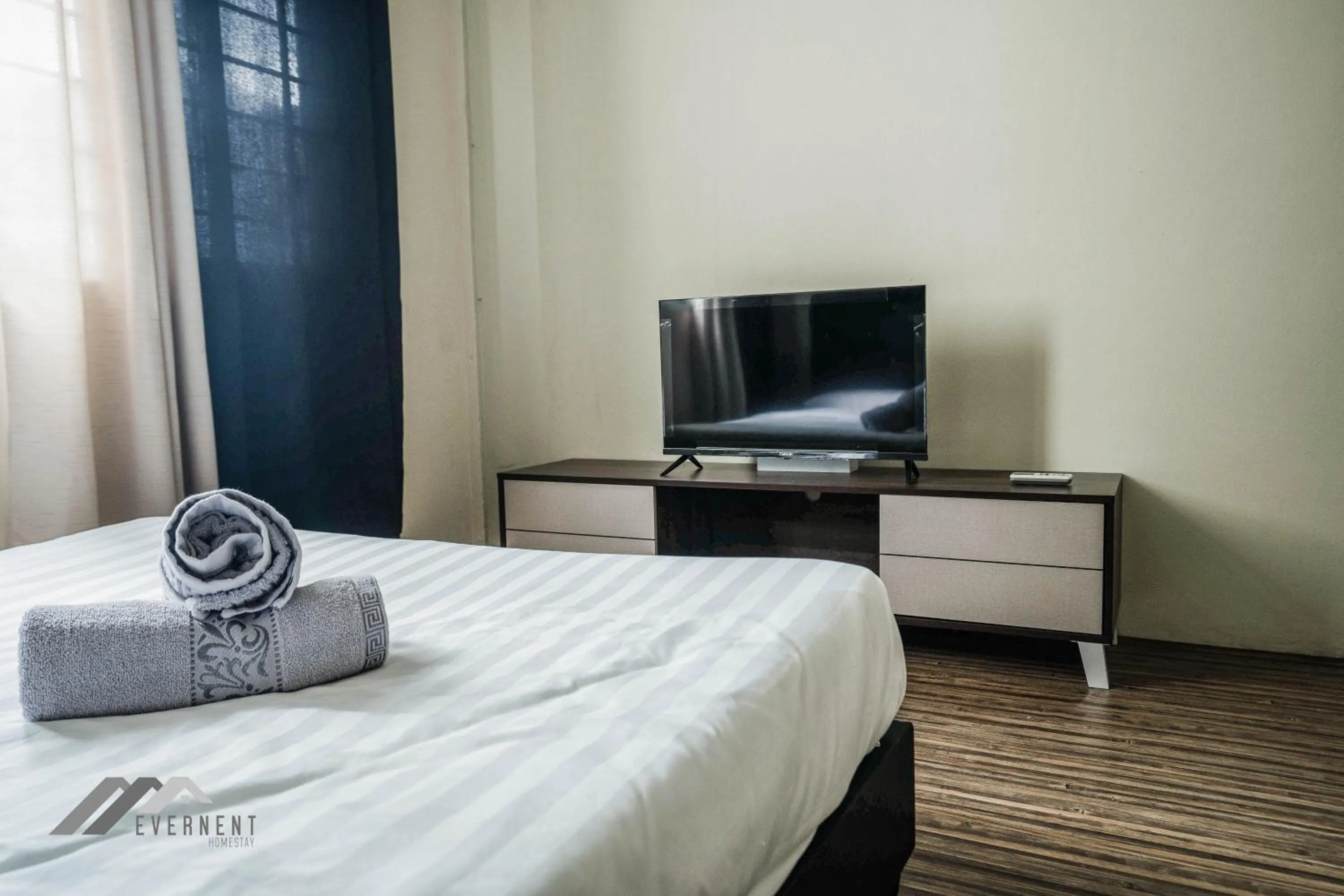 TV and multimedia, Bed in Permaisuri Homestay by Evernent