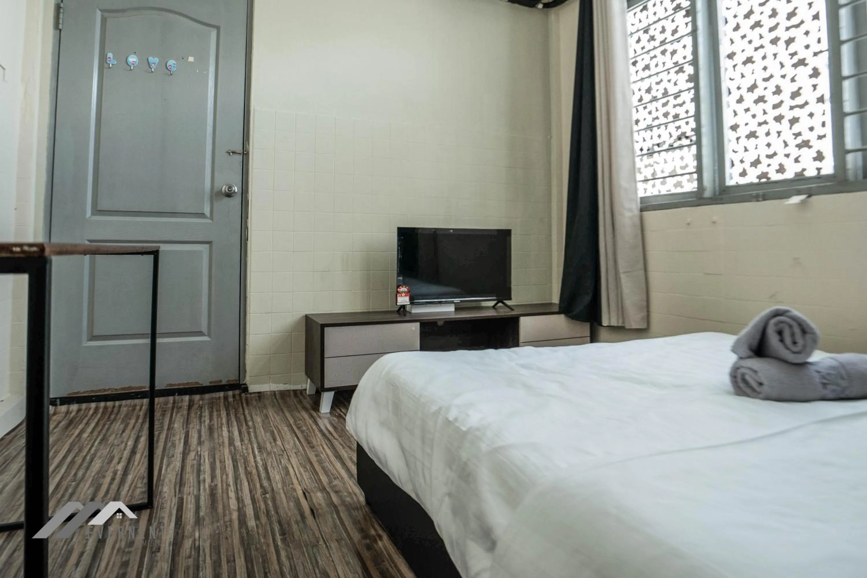 TV and multimedia, Bed in Permaisuri Homestay by Evernent