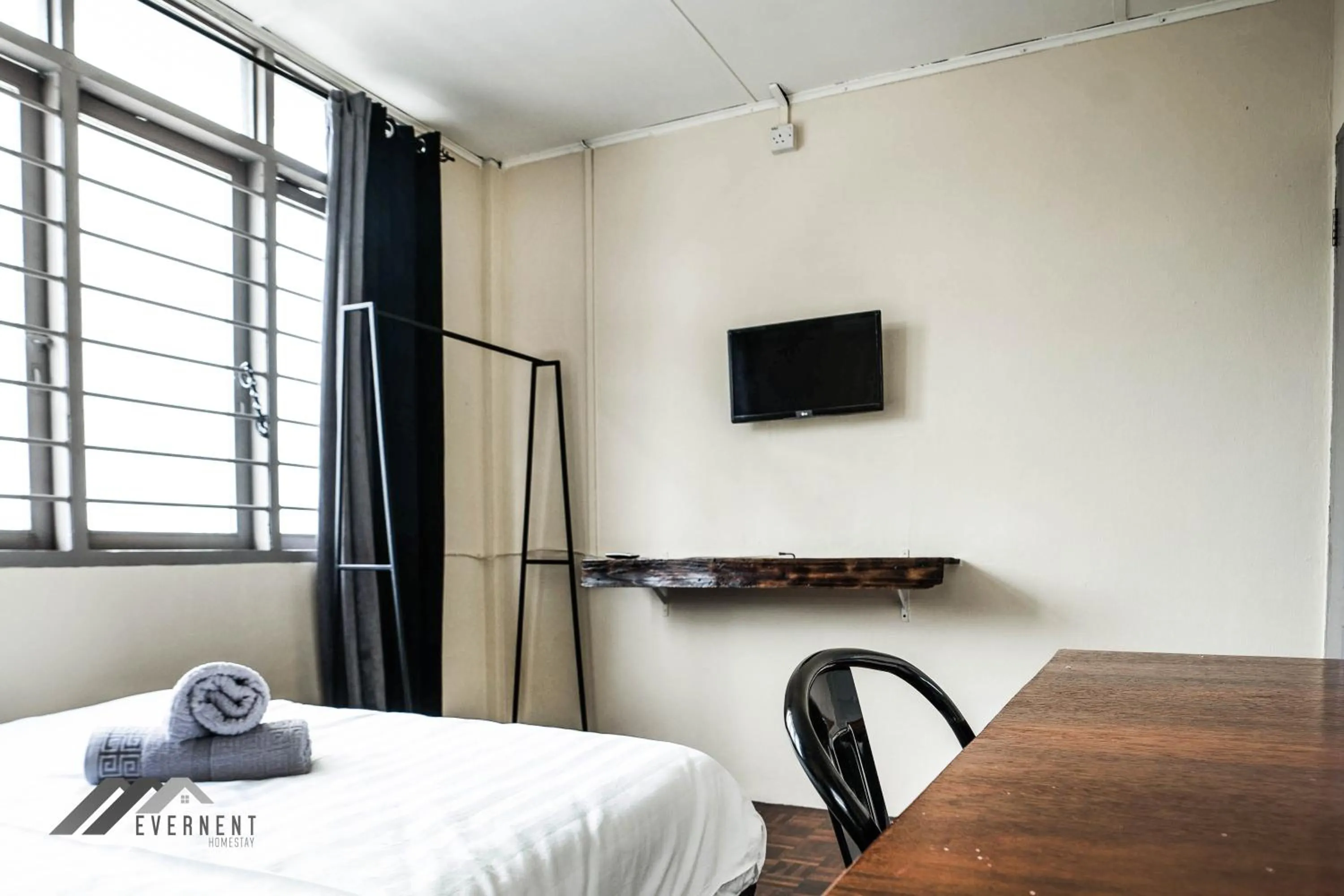 TV and multimedia, Bed in Permaisuri Homestay by Evernent