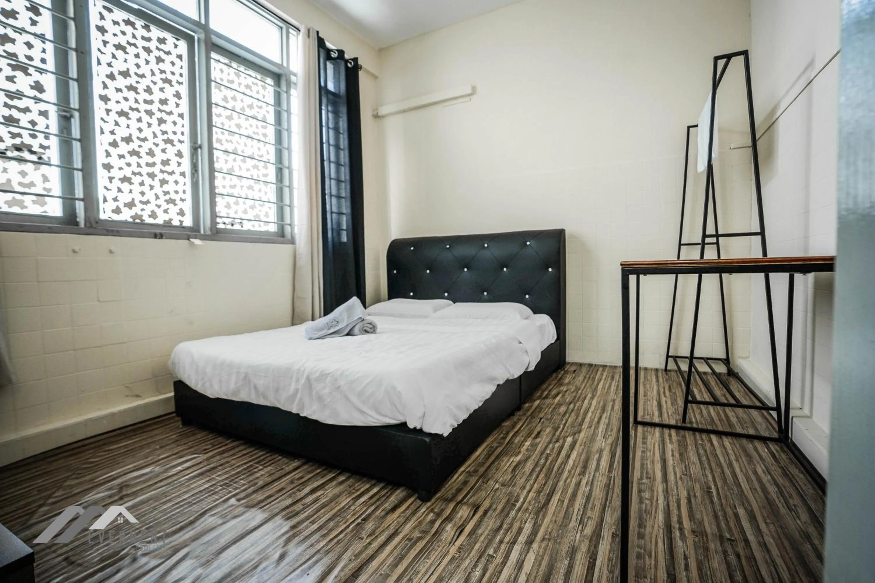 Bed in Permaisuri Homestay by Evernent