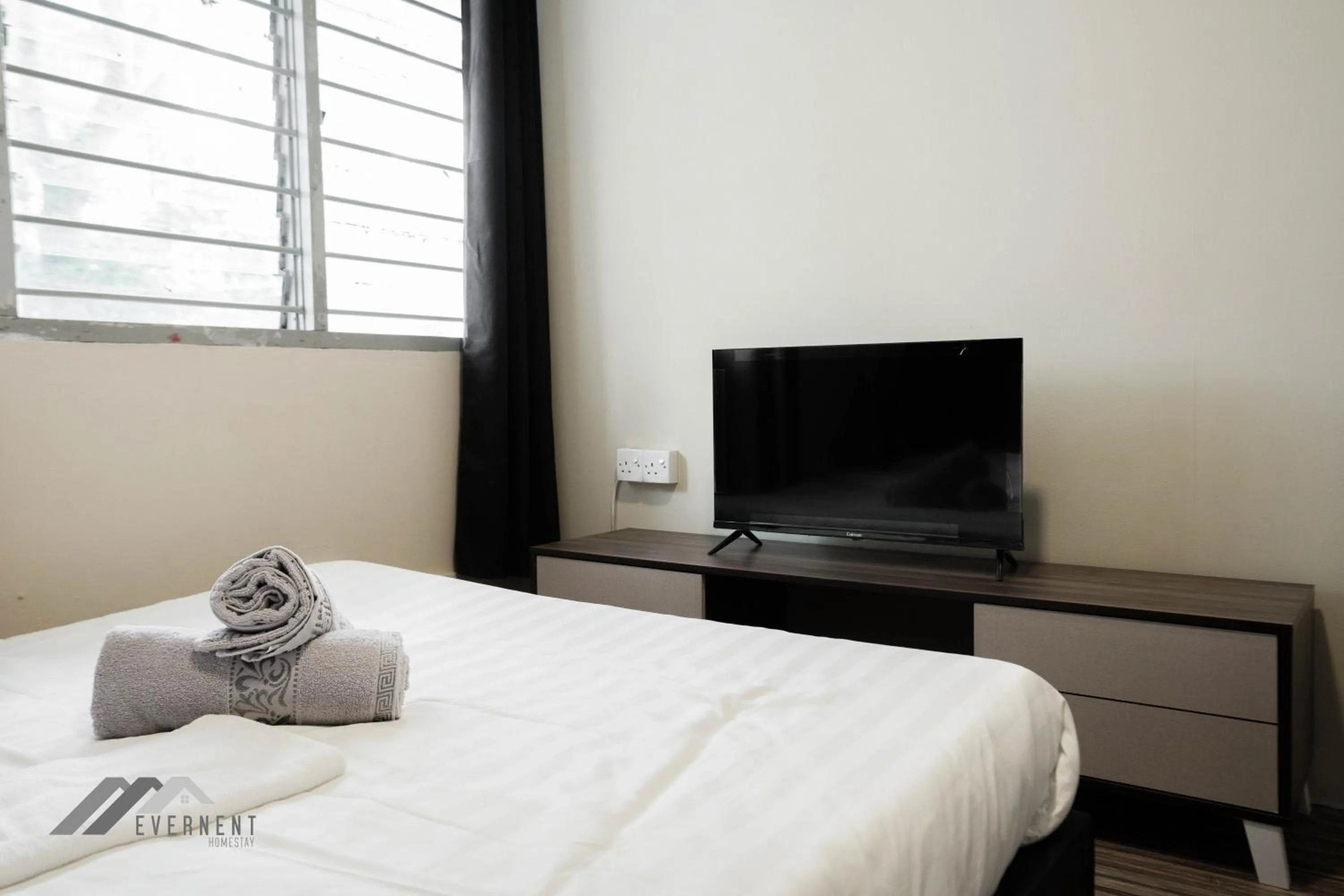 Bed in Permaisuri Homestay by Evernent