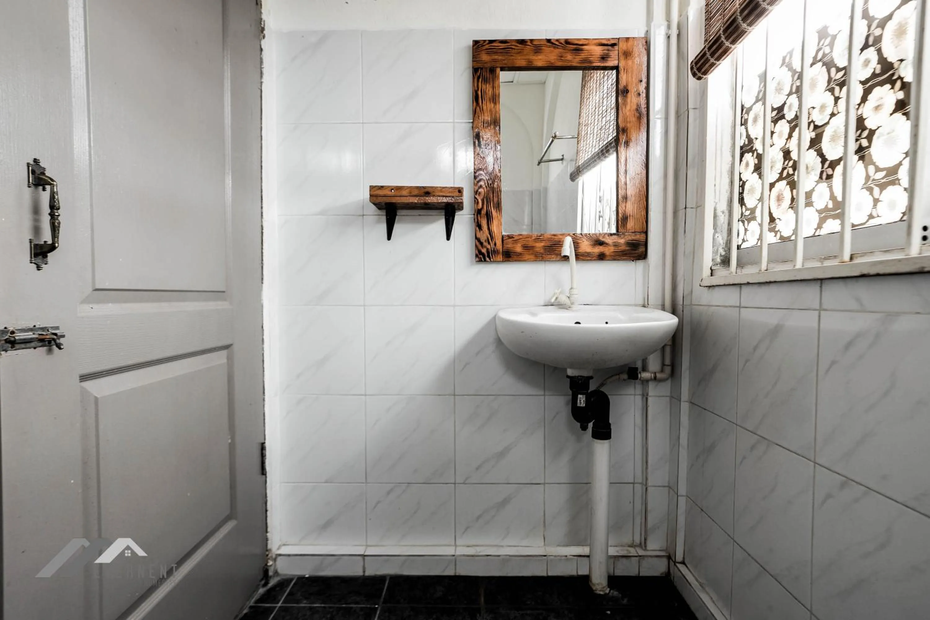 Bathroom in Permaisuri Homestay by Evernent