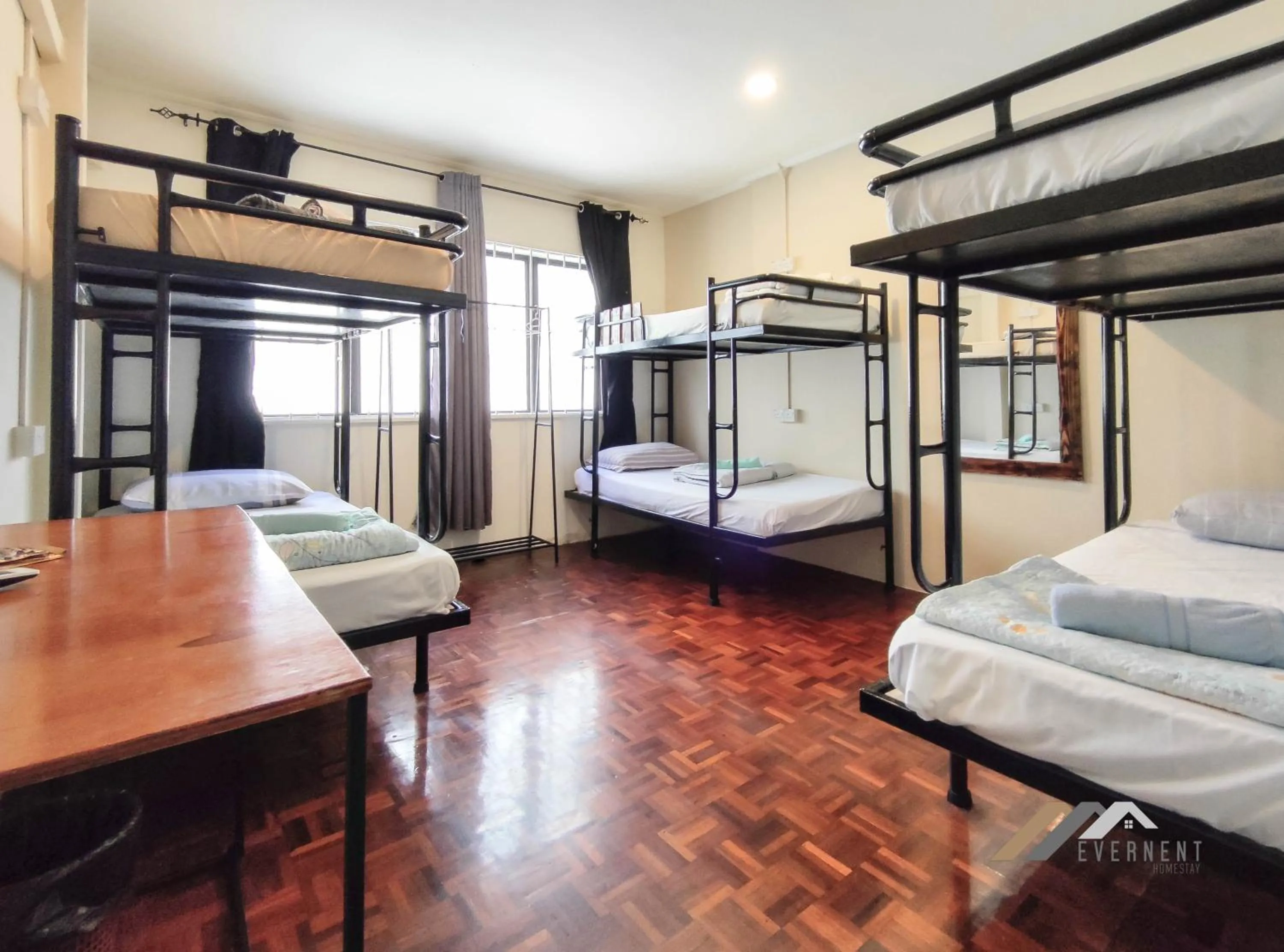 Bed in Permaisuri Homestay by Evernent