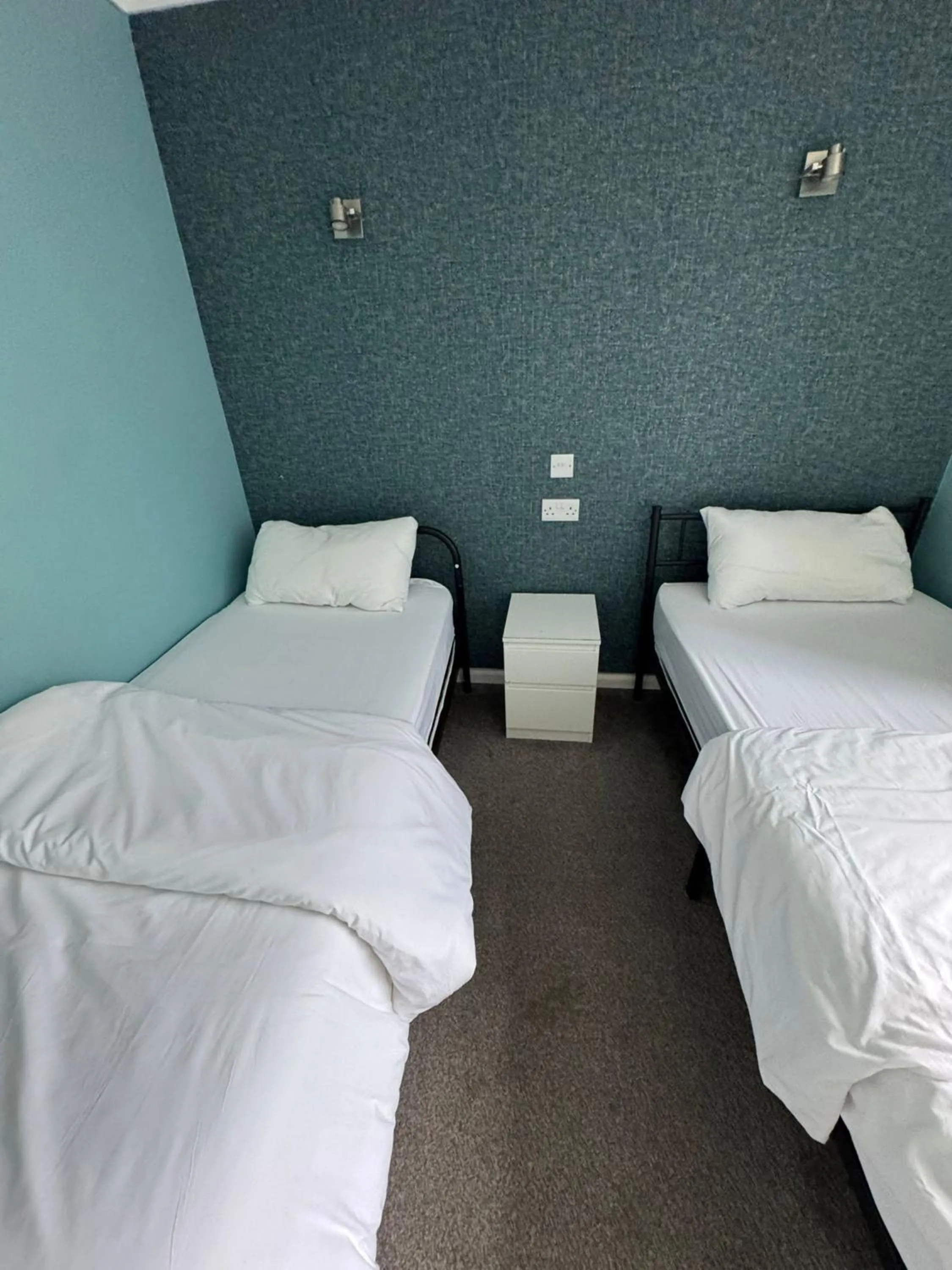 Bedroom, Bed in White Rose Hotel and Restaurant