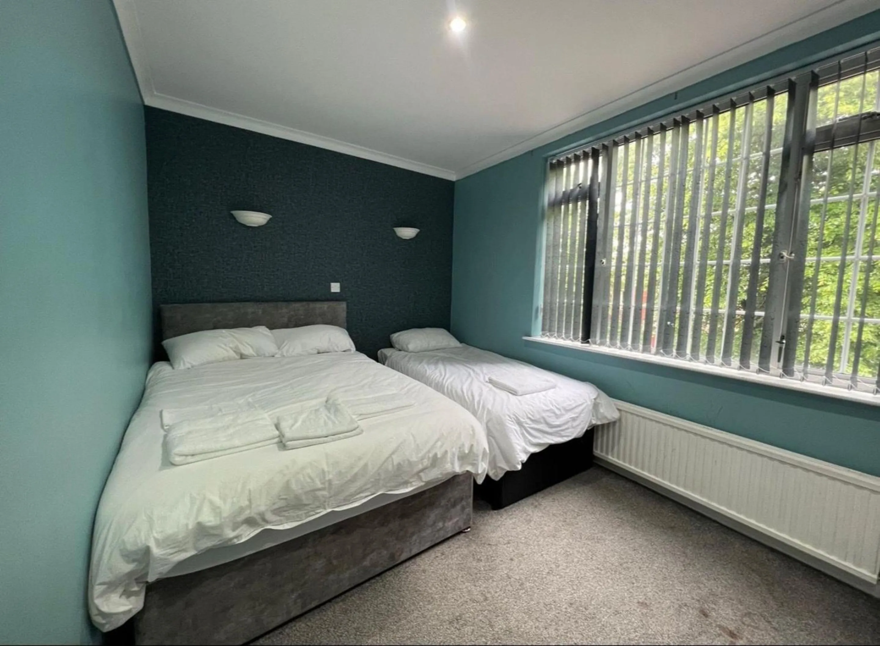 Bedroom, Bed in White Rose Hotel and Restaurant