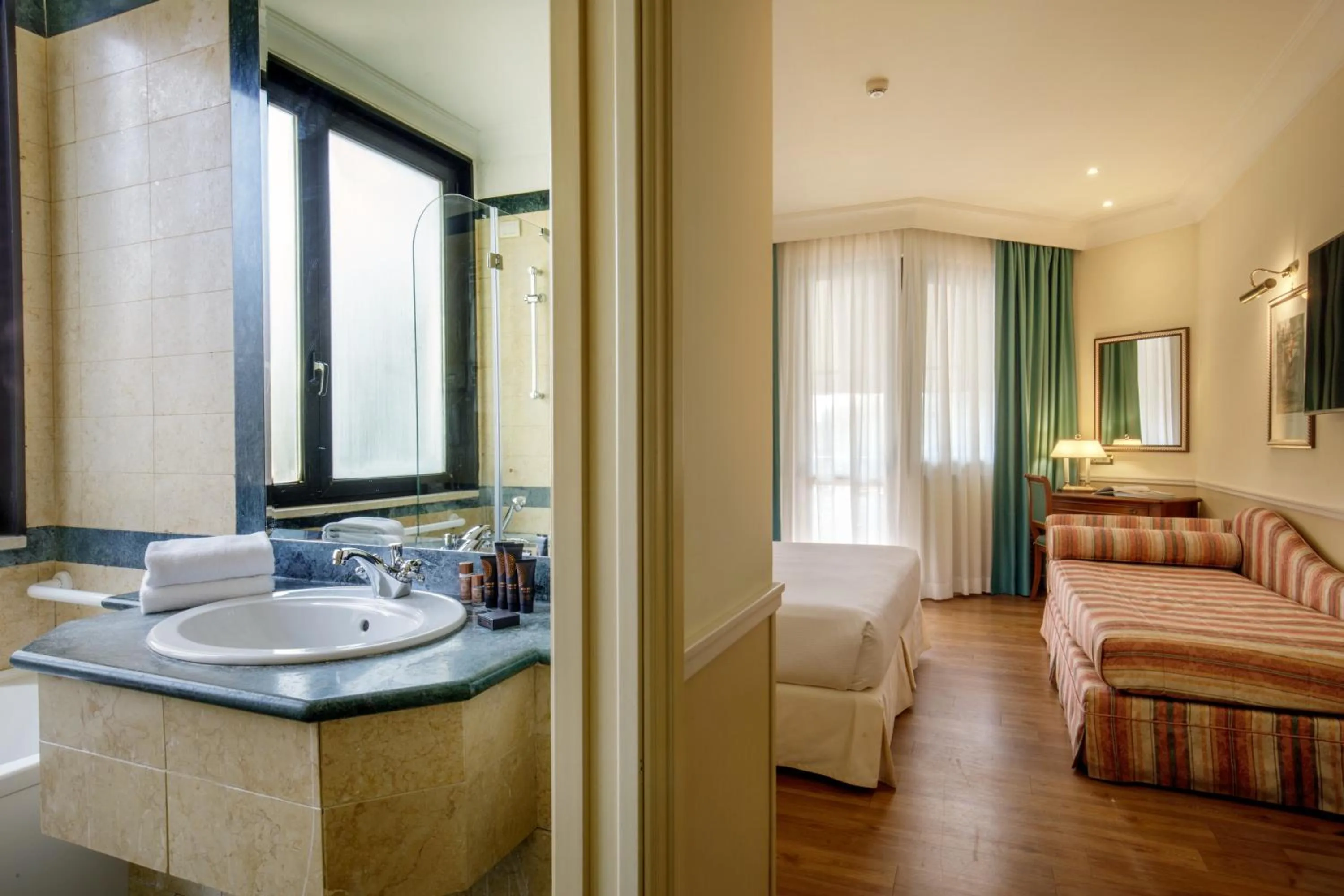 Bed in Donna Laura Palace by OMNIA hotels