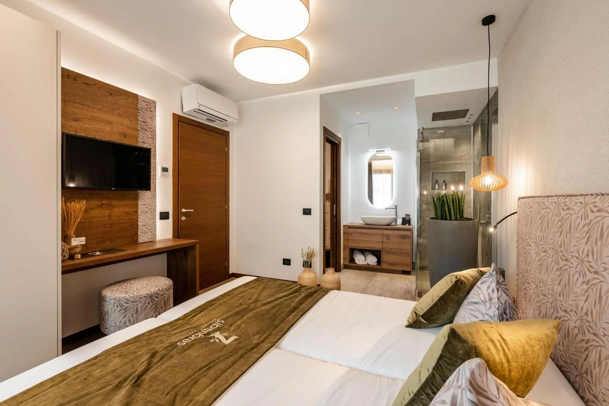 Bed in Sibenbras Natural Aparthotel