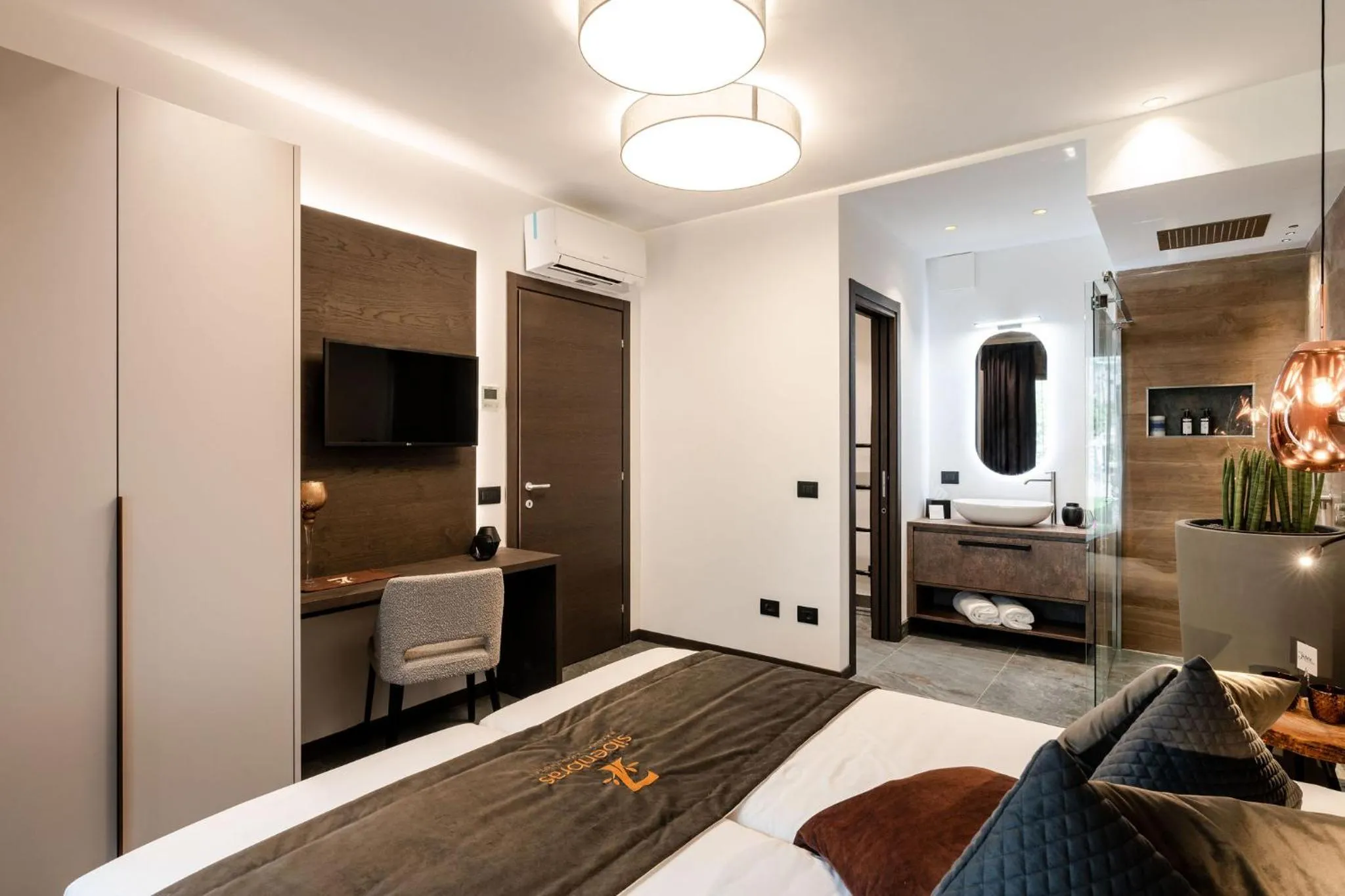 Bed in Sibenbras Natural Aparthotel