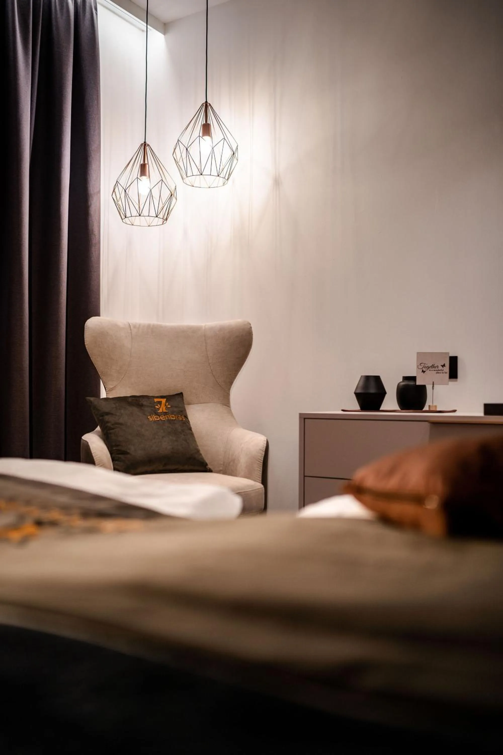 Bed in Sibenbras Natural Aparthotel