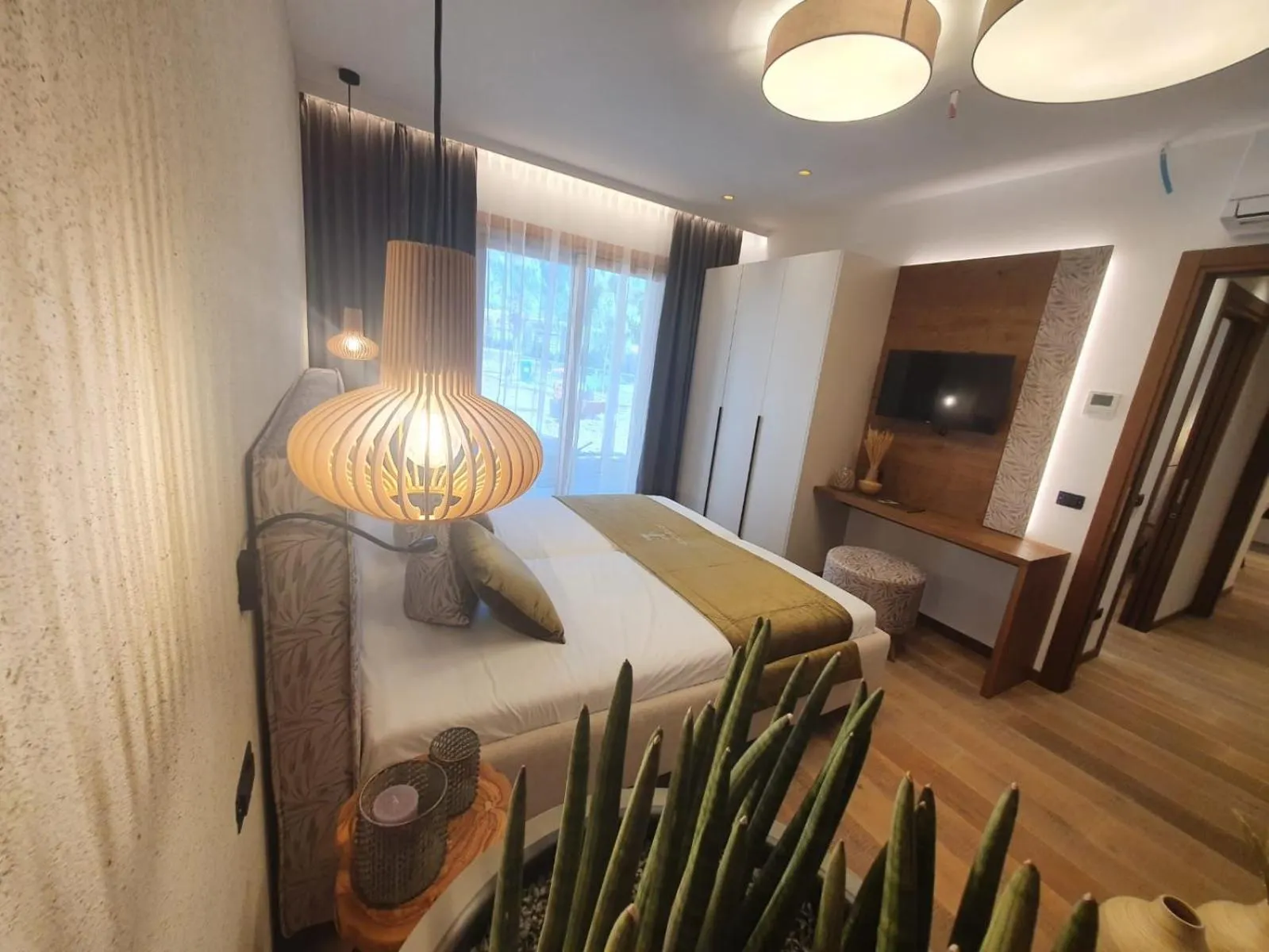 Bed in Sibenbras Natural Aparthotel