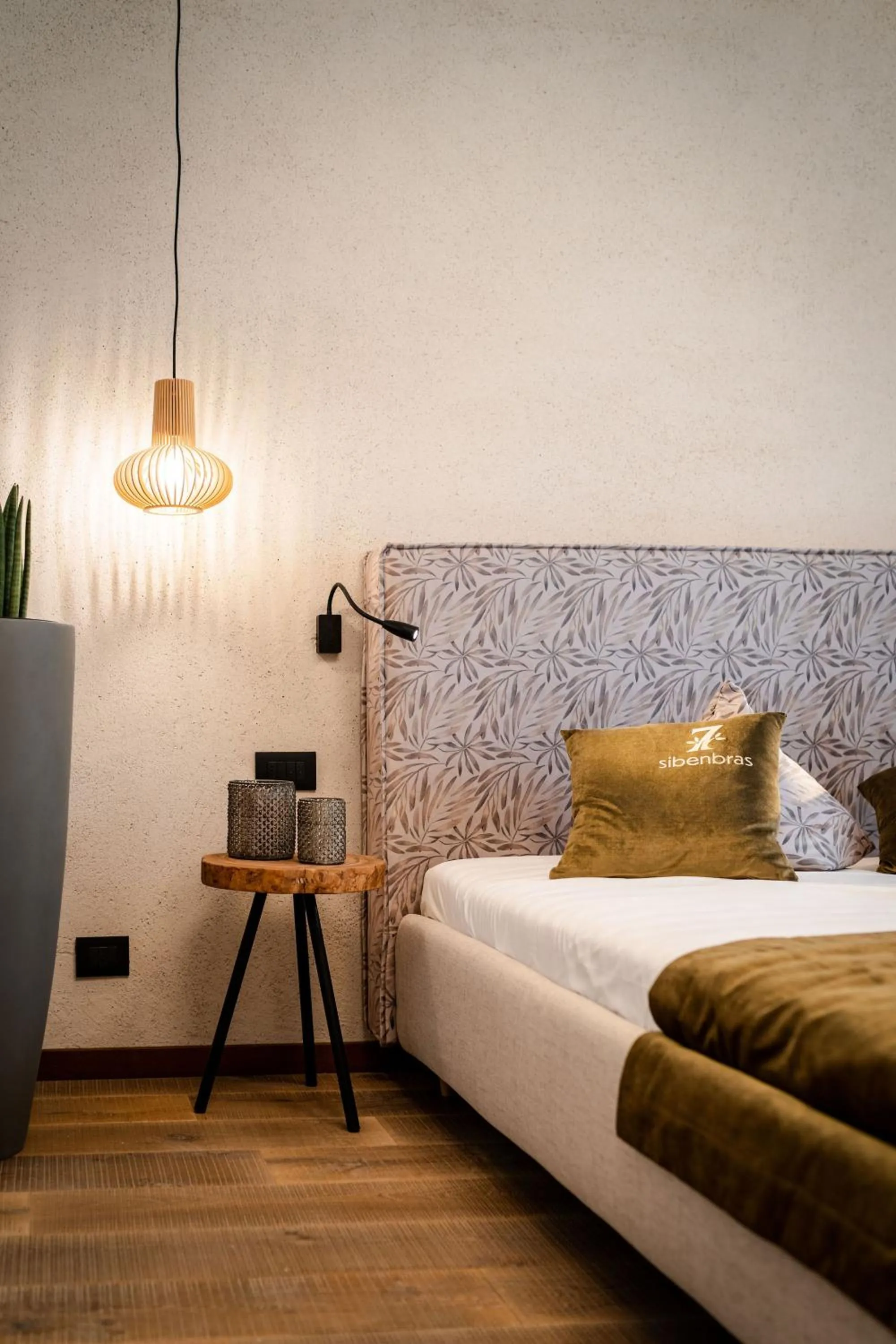 Bed in Sibenbras Natural Aparthotel