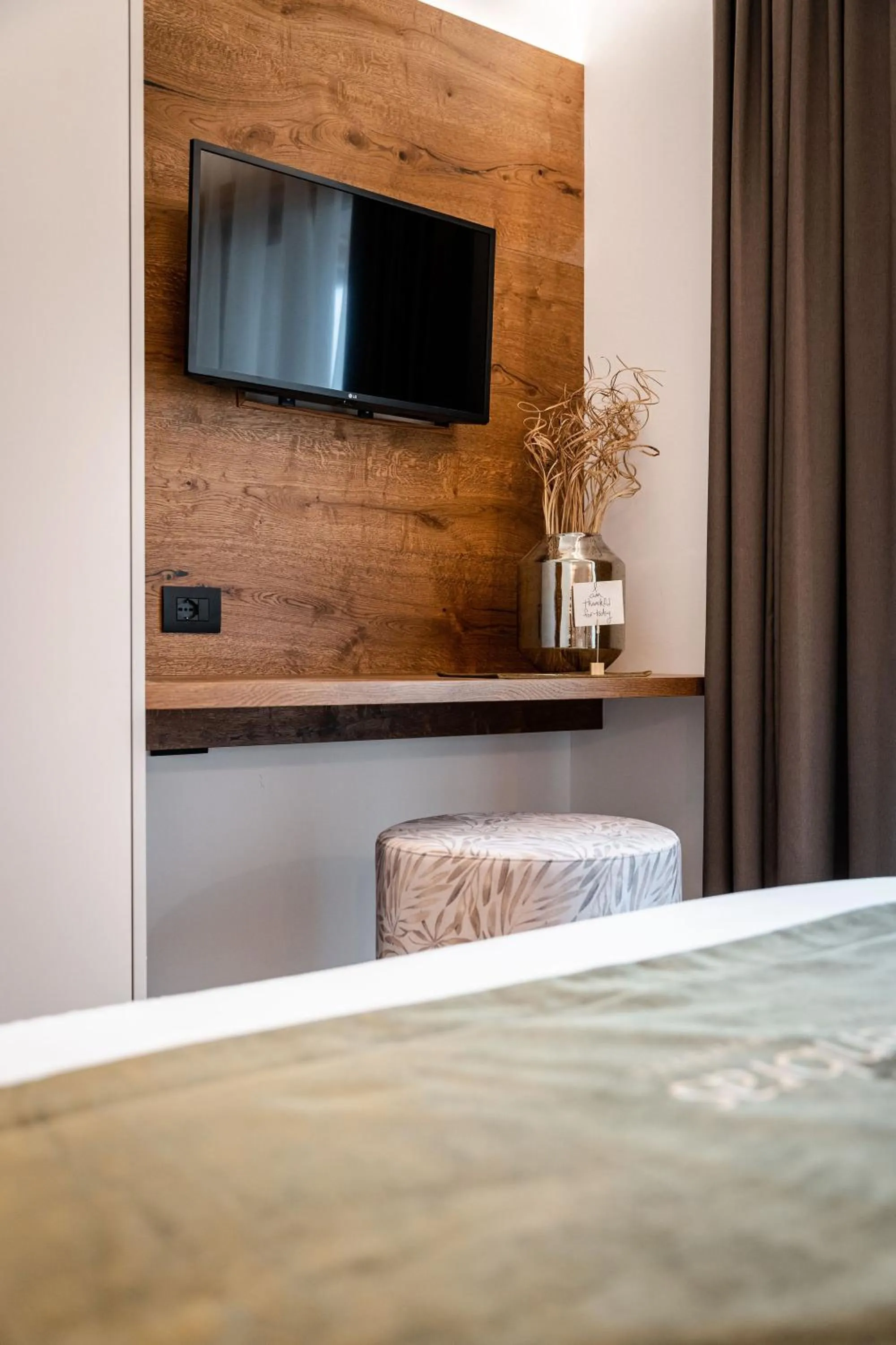 Bed in Sibenbras Natural Aparthotel