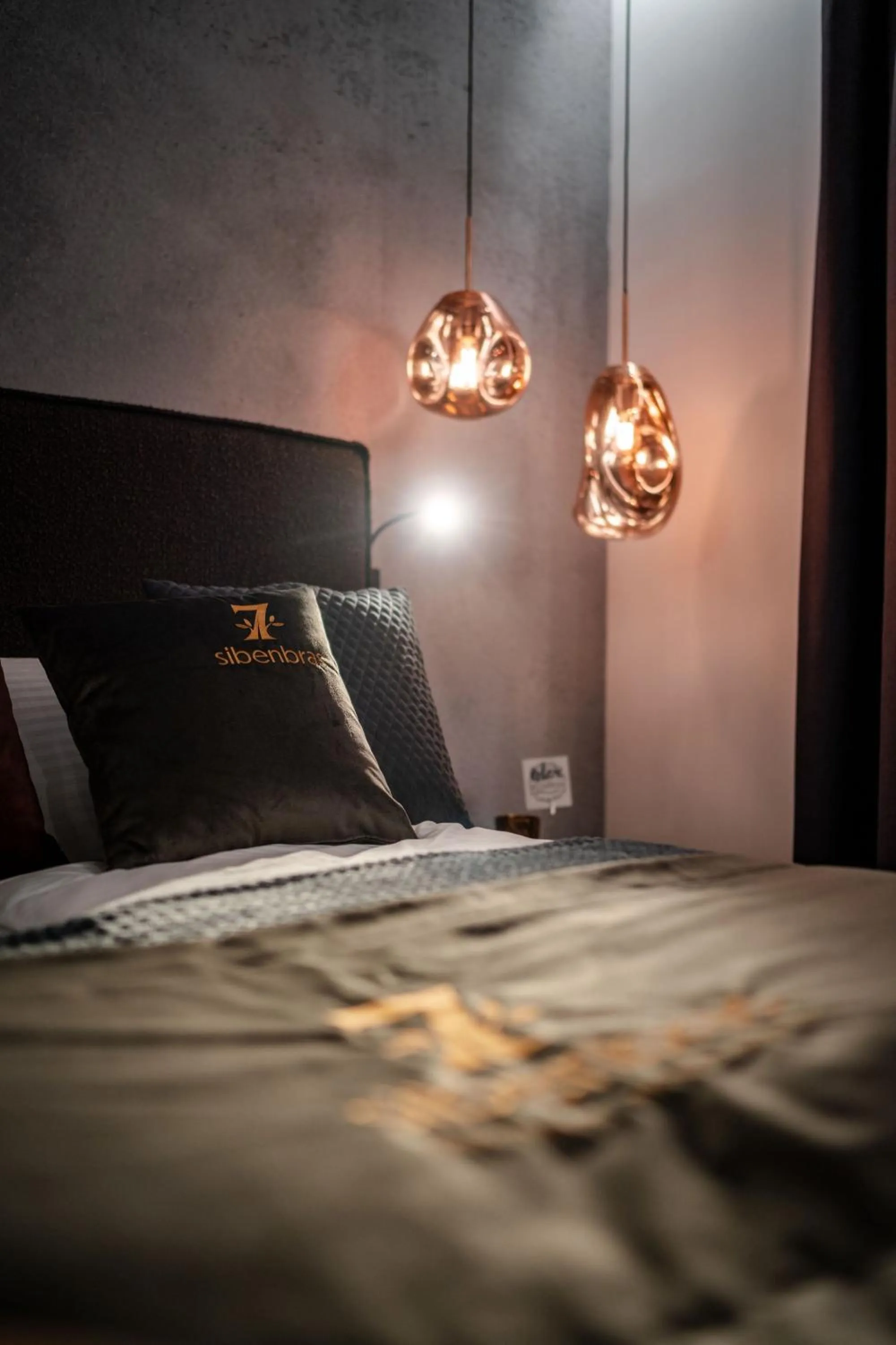 Bed in Sibenbras Natural Aparthotel