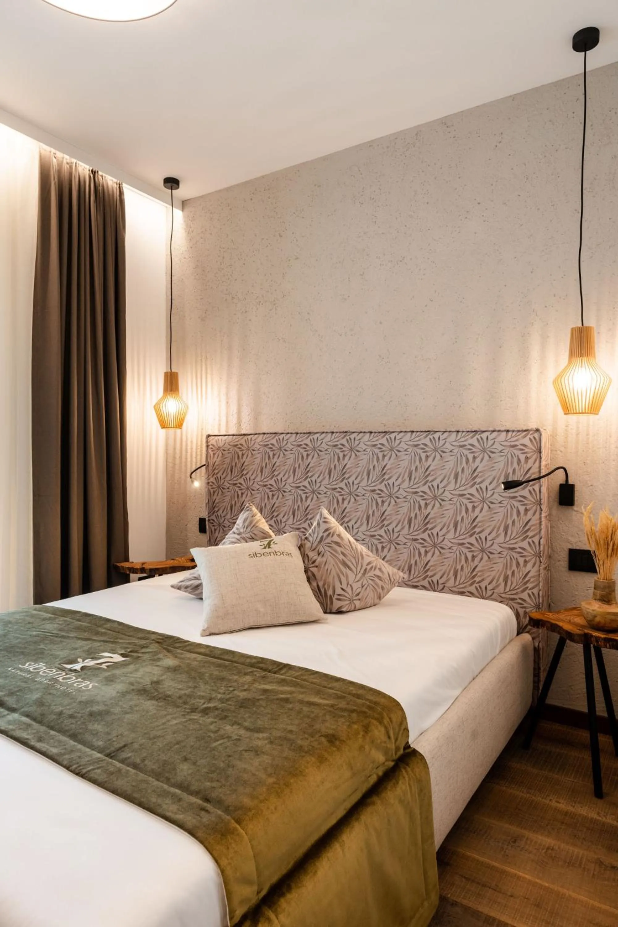 Bed in Sibenbras Natural Aparthotel