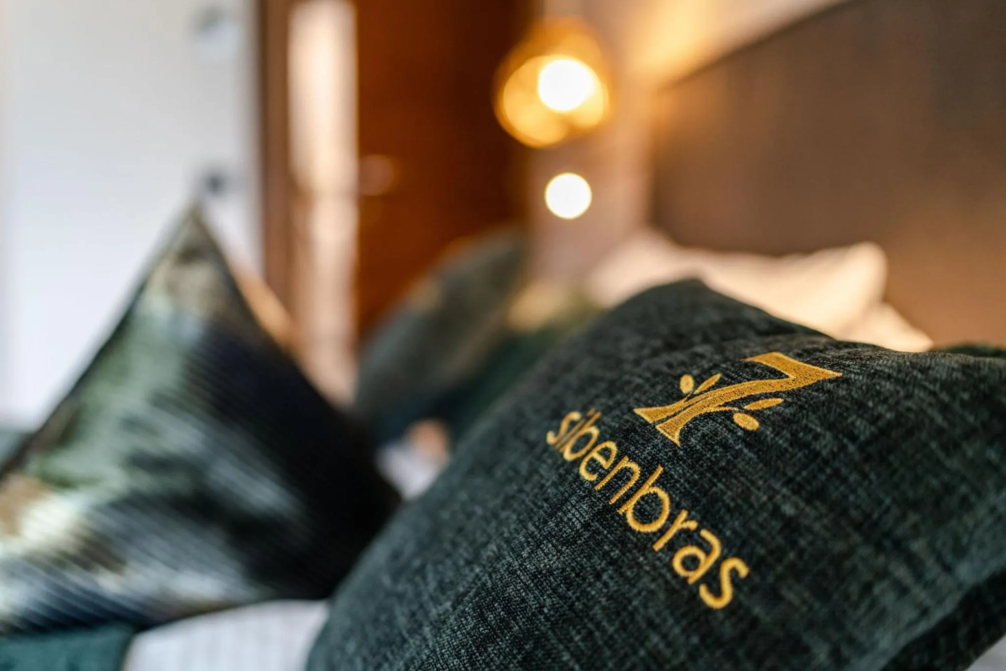 Bed in Sibenbras Natural Aparthotel