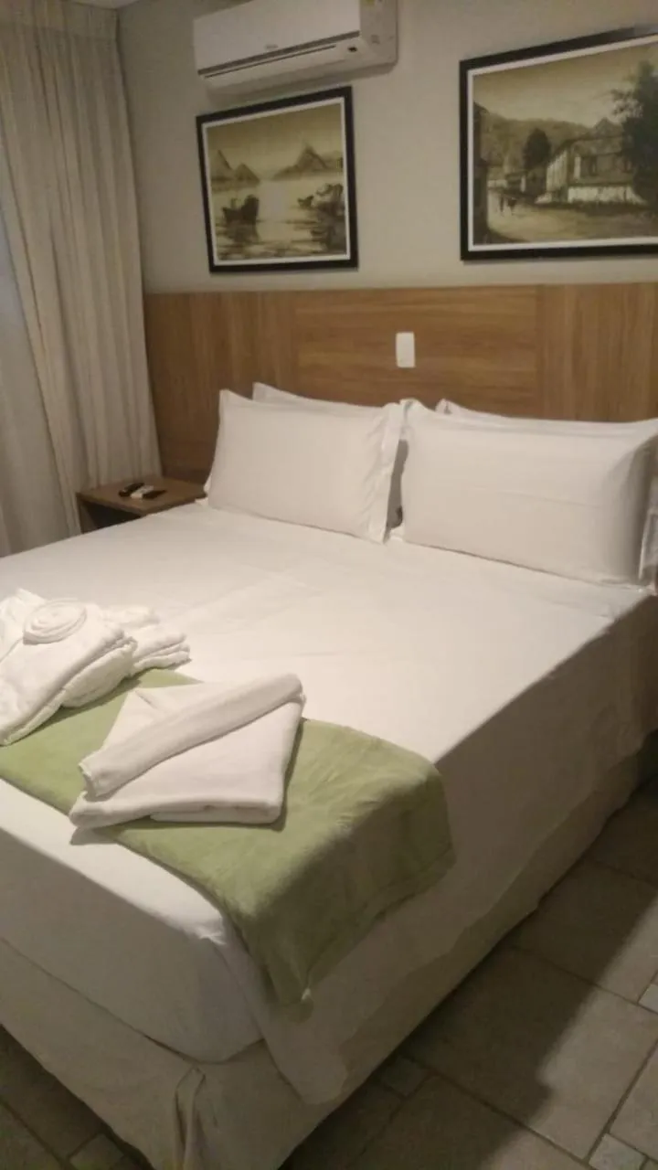 Bed in WINNER BEACH HOTEL