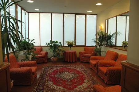 Communal lounge/ TV room in Hotel Beatrice