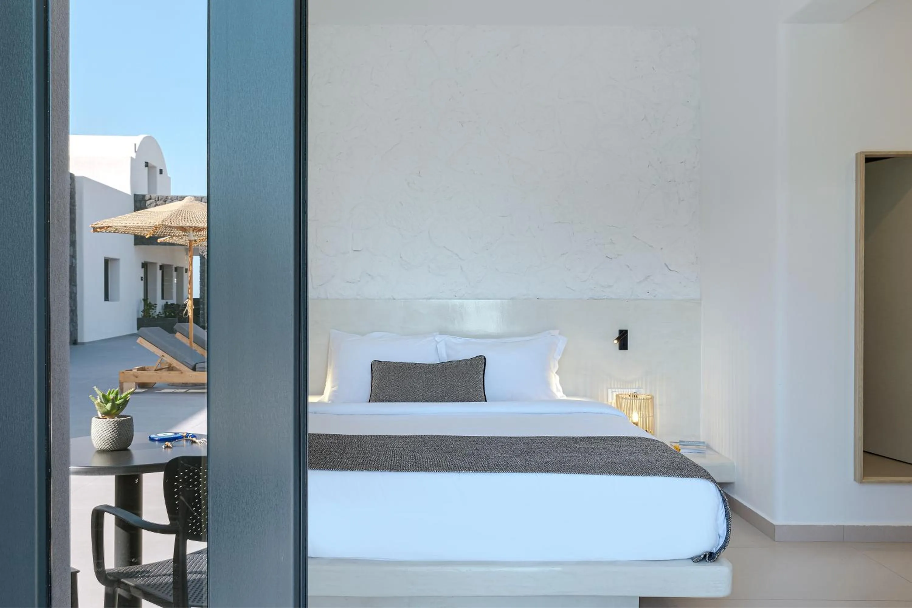 Bed in Onyx Hotel & Suites