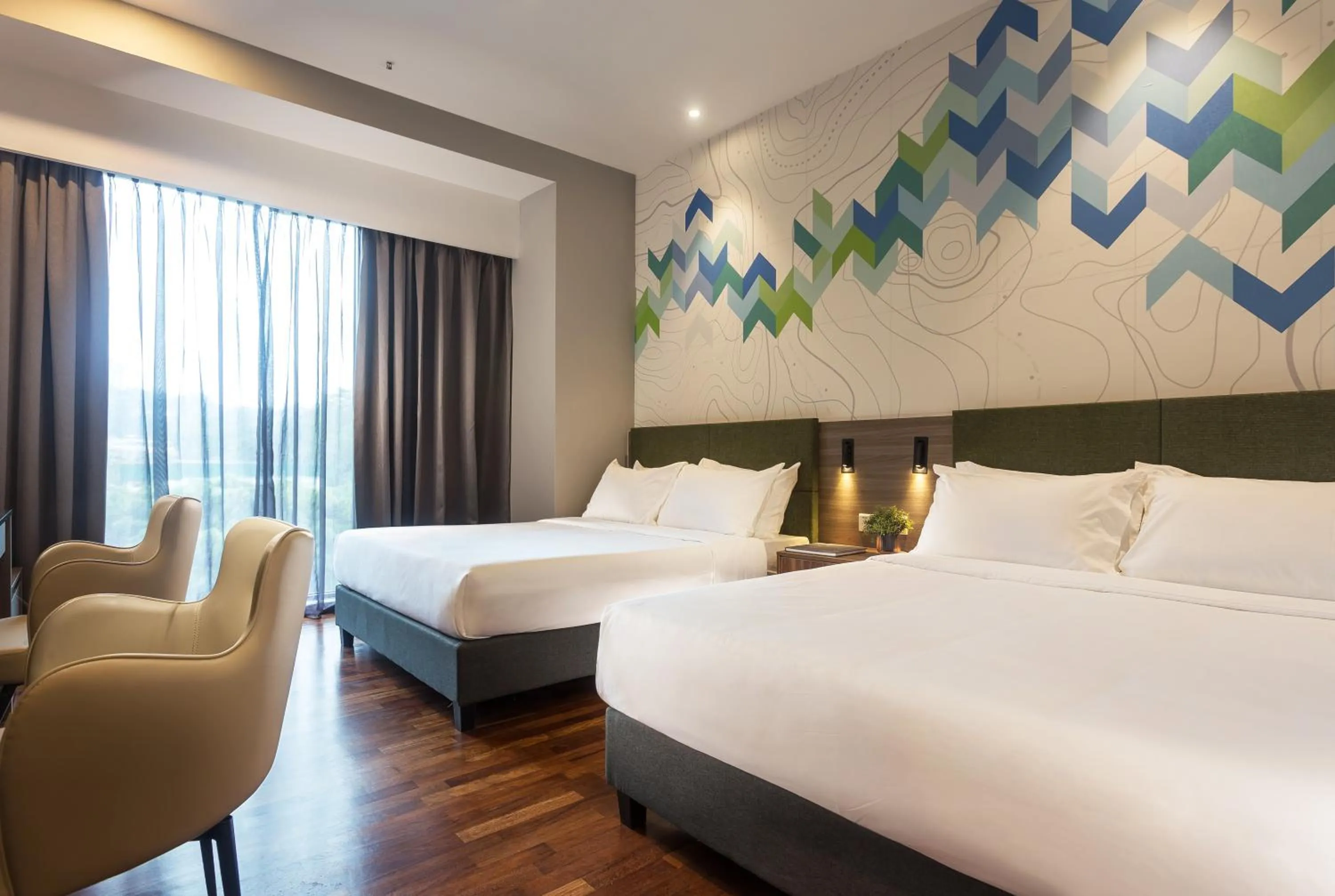 Bed in Le Vert Boutique Hotel