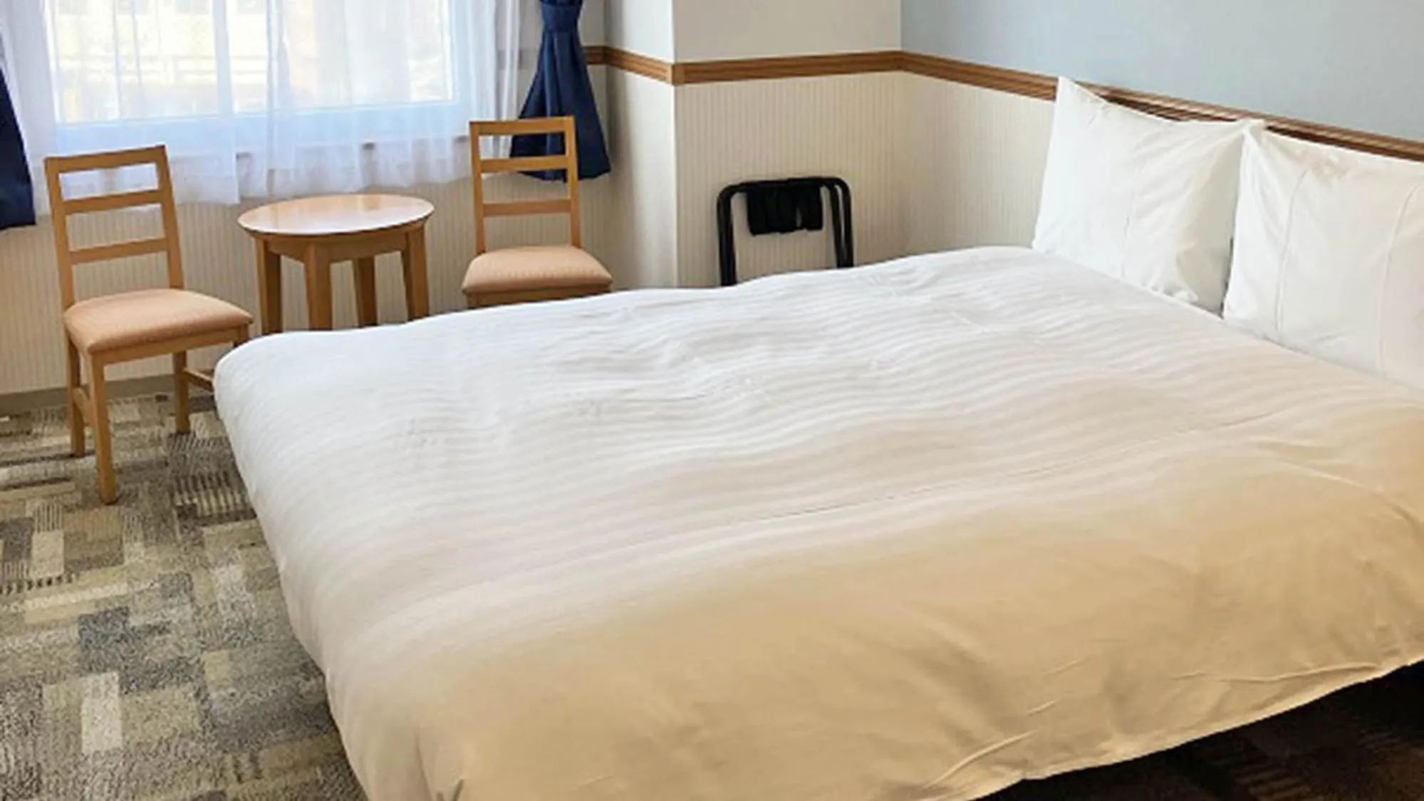 Bed in Toyoko Inn Toyama eki Shinkansen guchi No 1