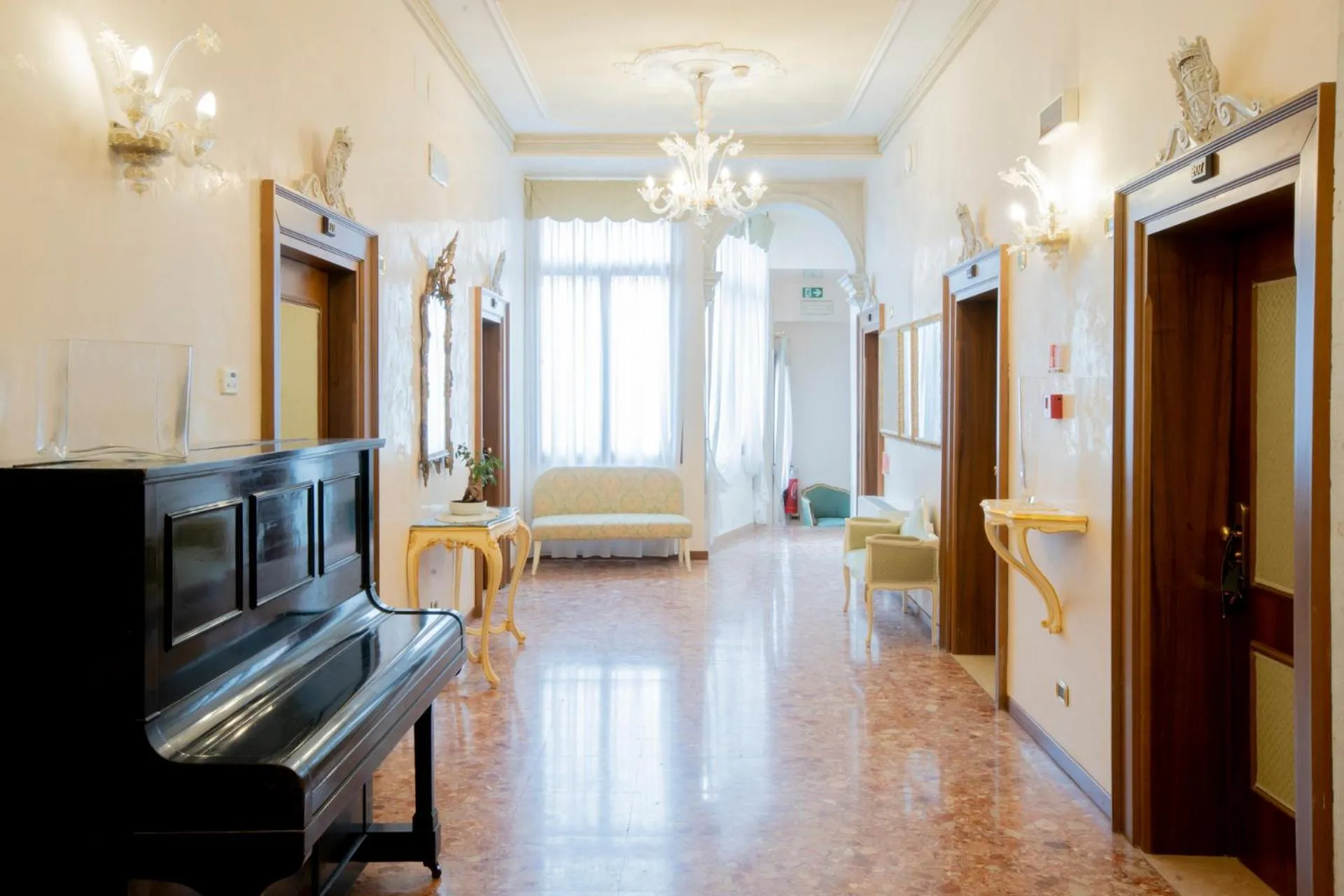 Communal lounge/ TV room, Bed in Hotel Ateneo