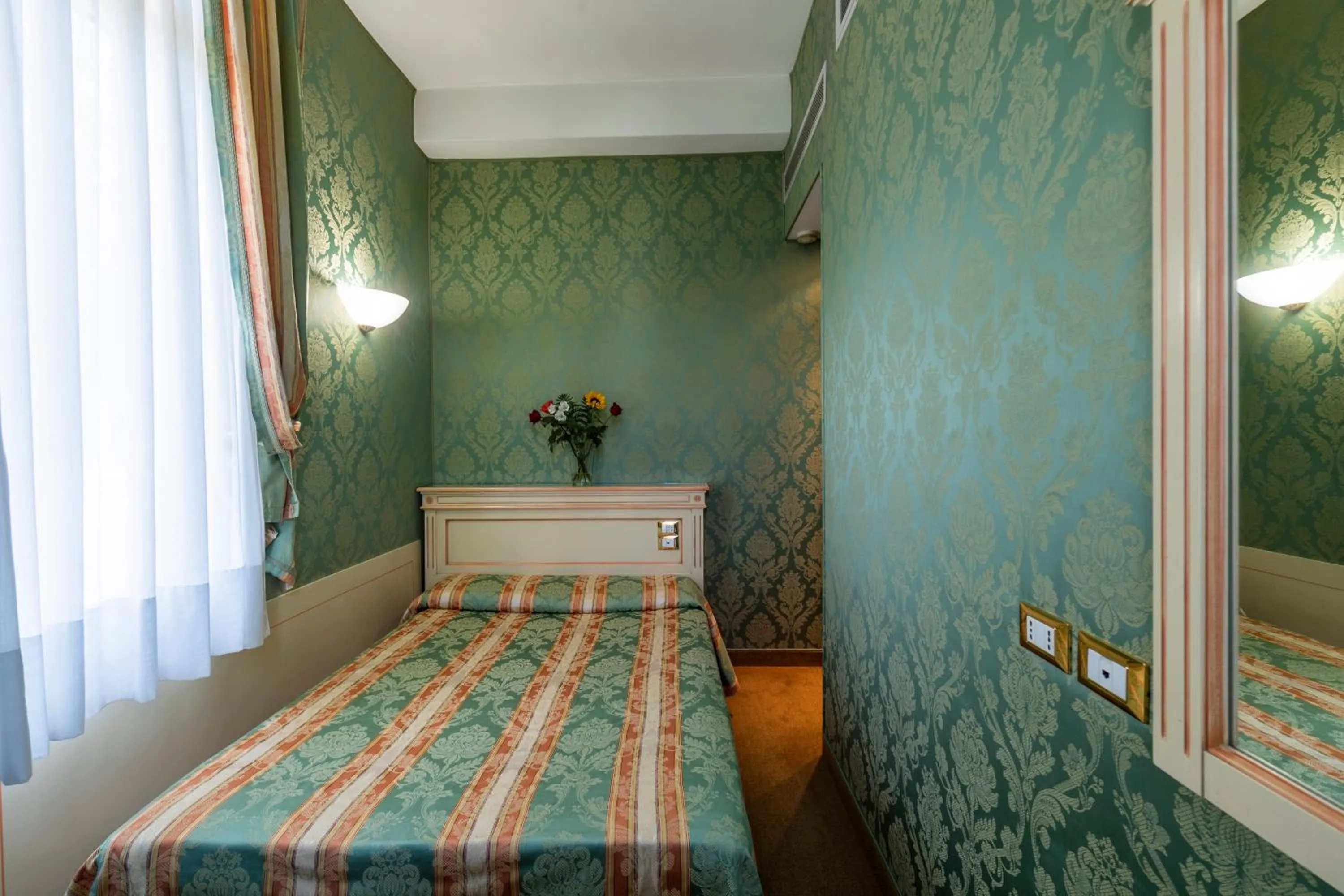 Bed in Hotel Villa Delle Palme
