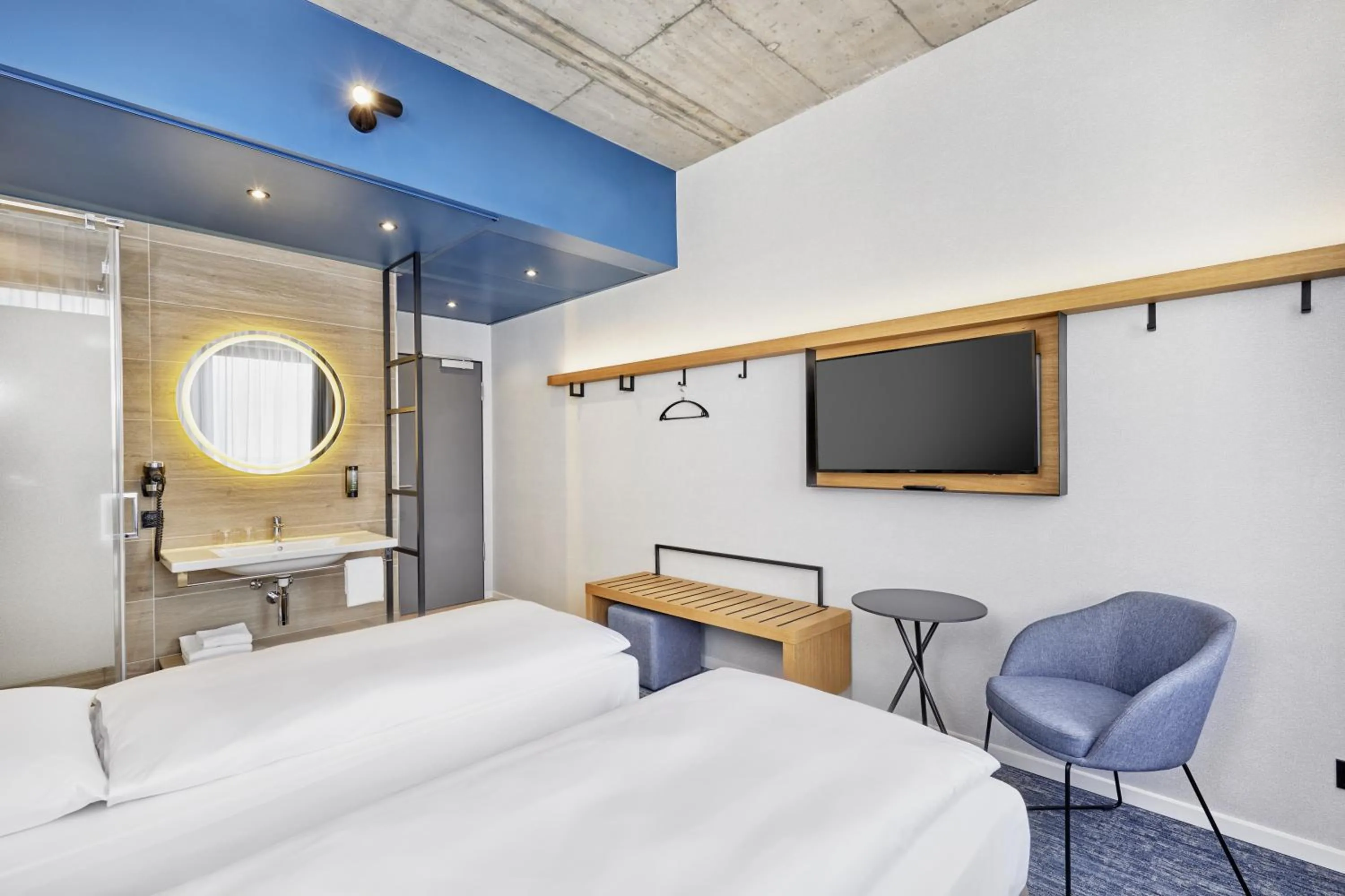 Bed in H2 Hotel Düsseldorf Seestern