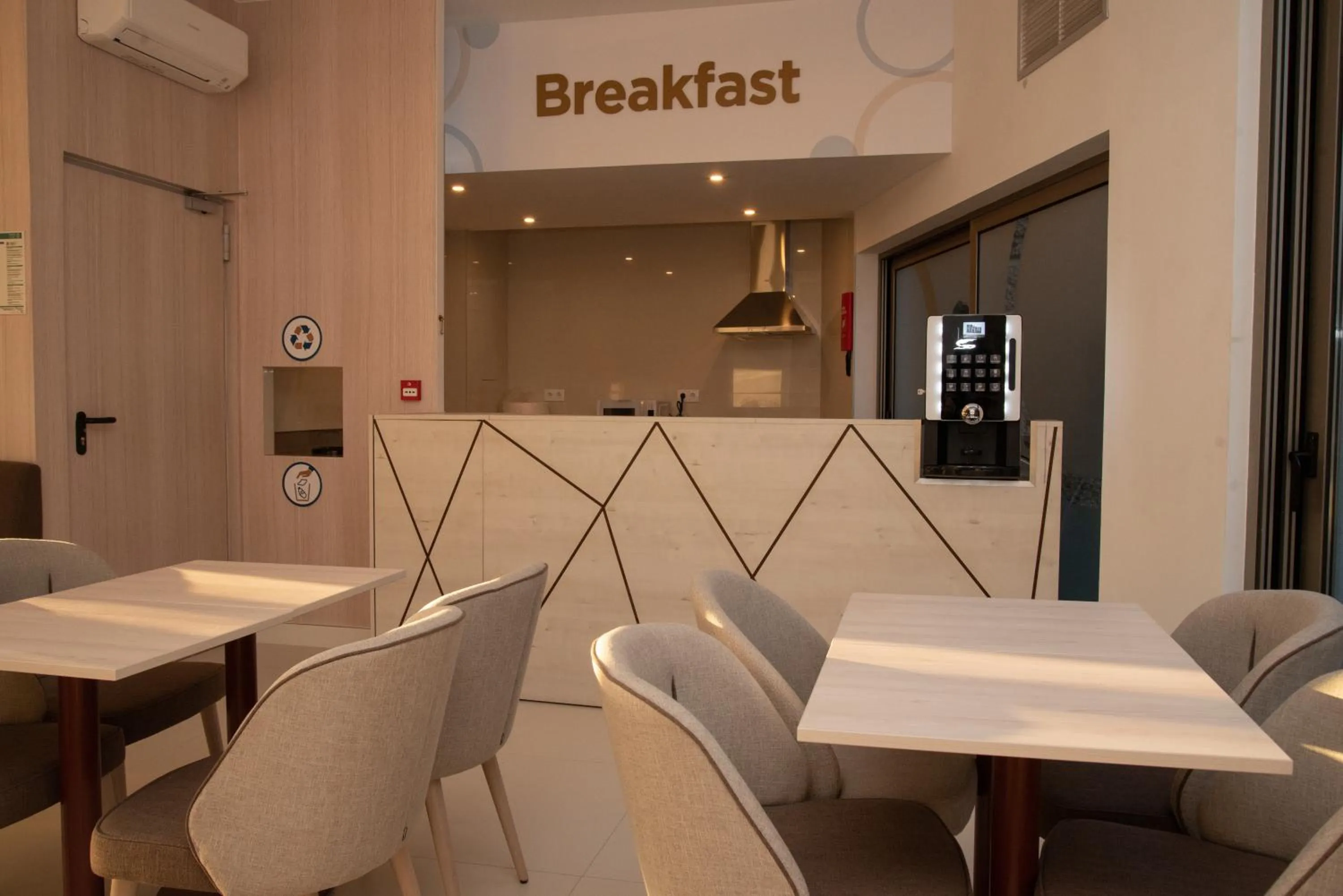 Seating area in Hotel Porto Interface Trindade By Kavia