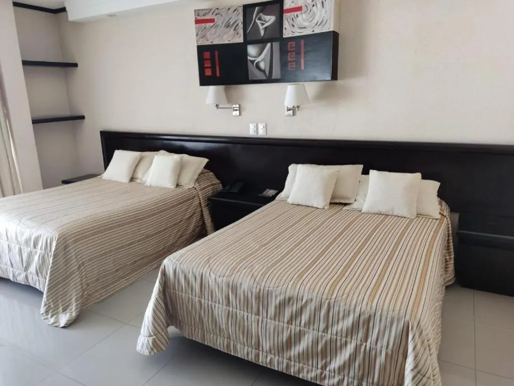 Bed in Hotel Mary Celaya