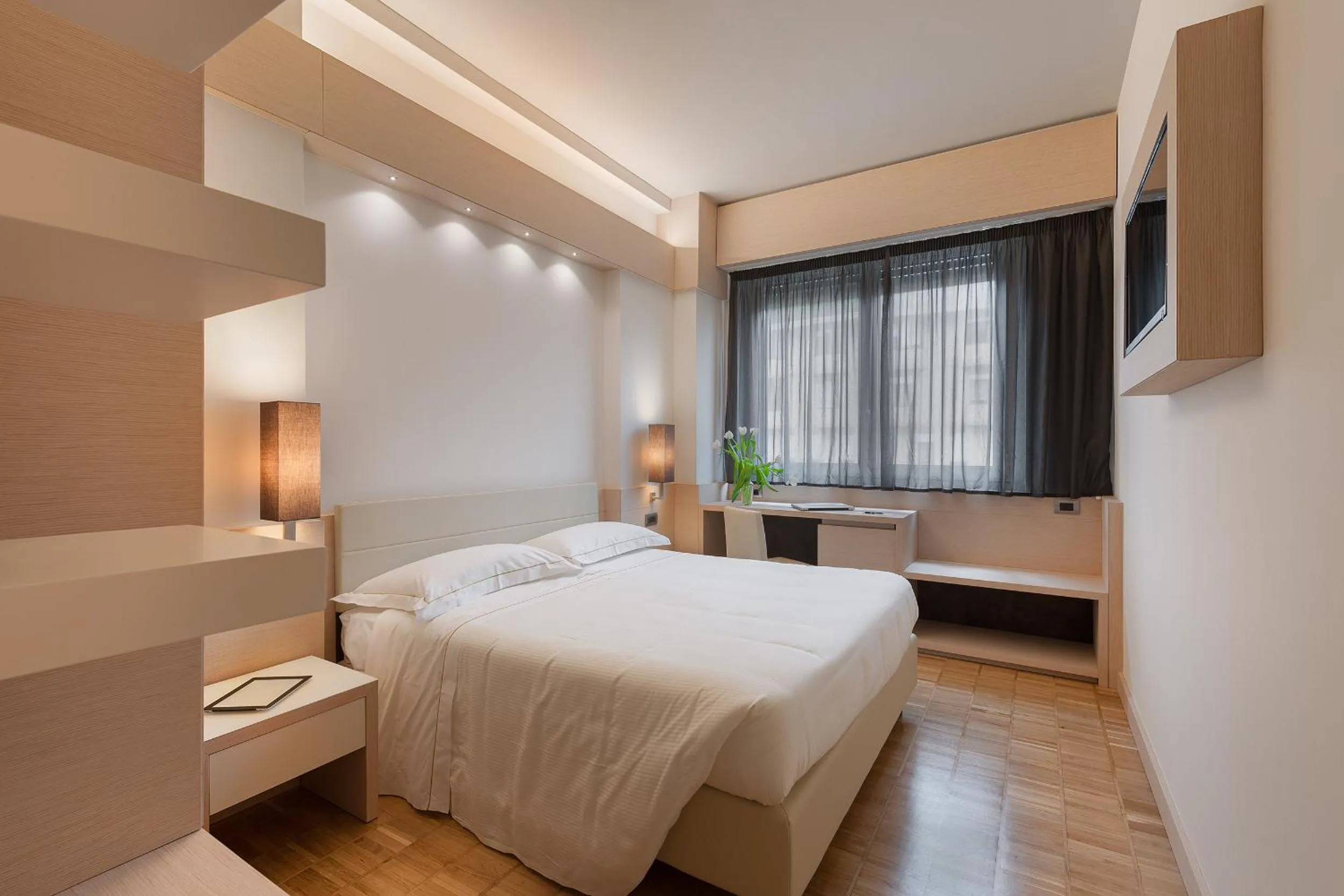 Bed in Hotel Ariston