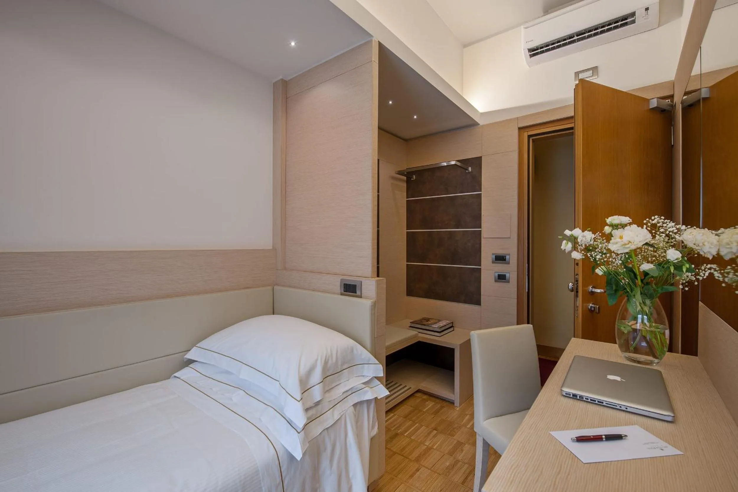 Bed in Hotel Ariston