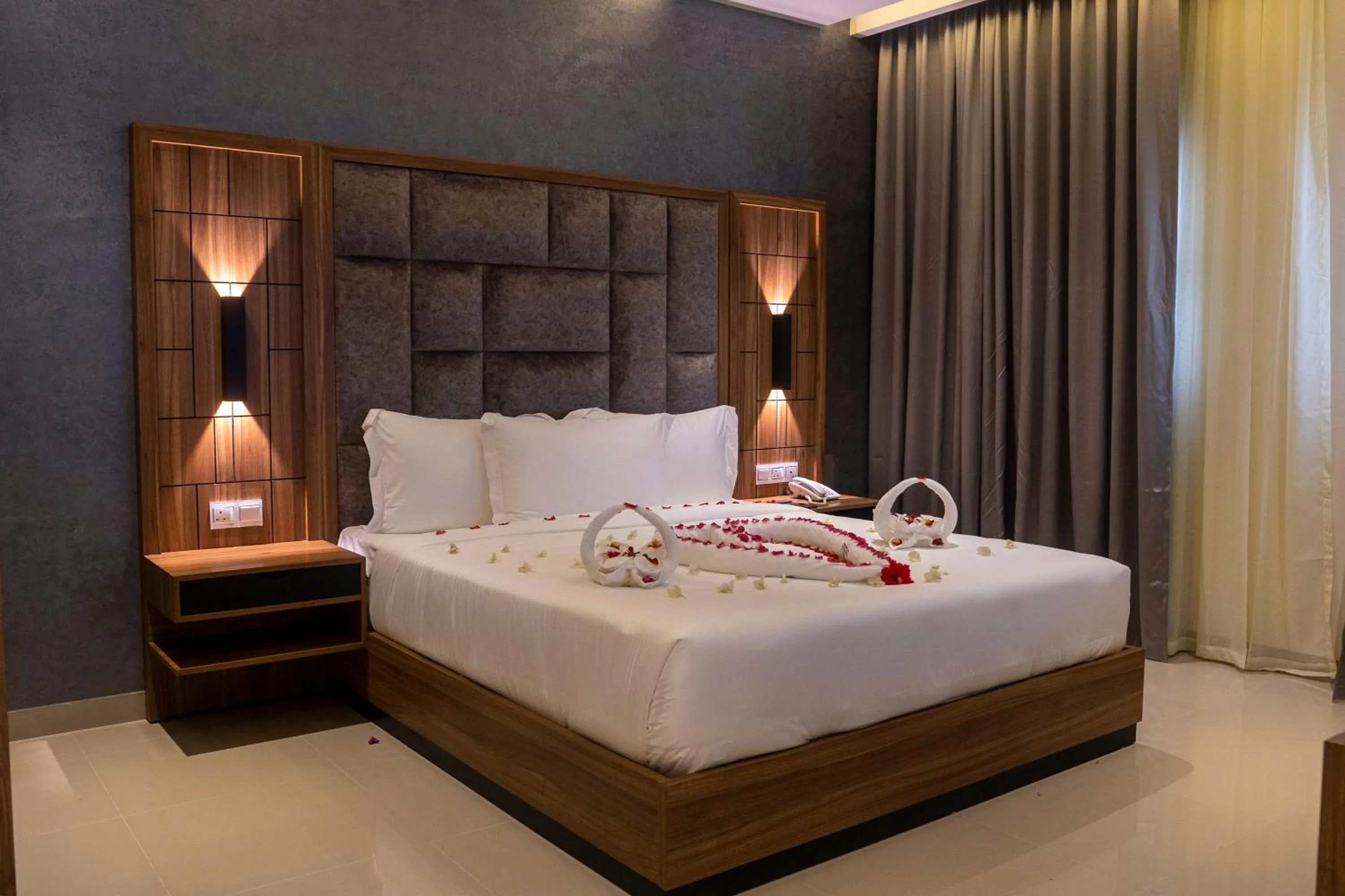 Bed in The Plaza Hotel & Resort