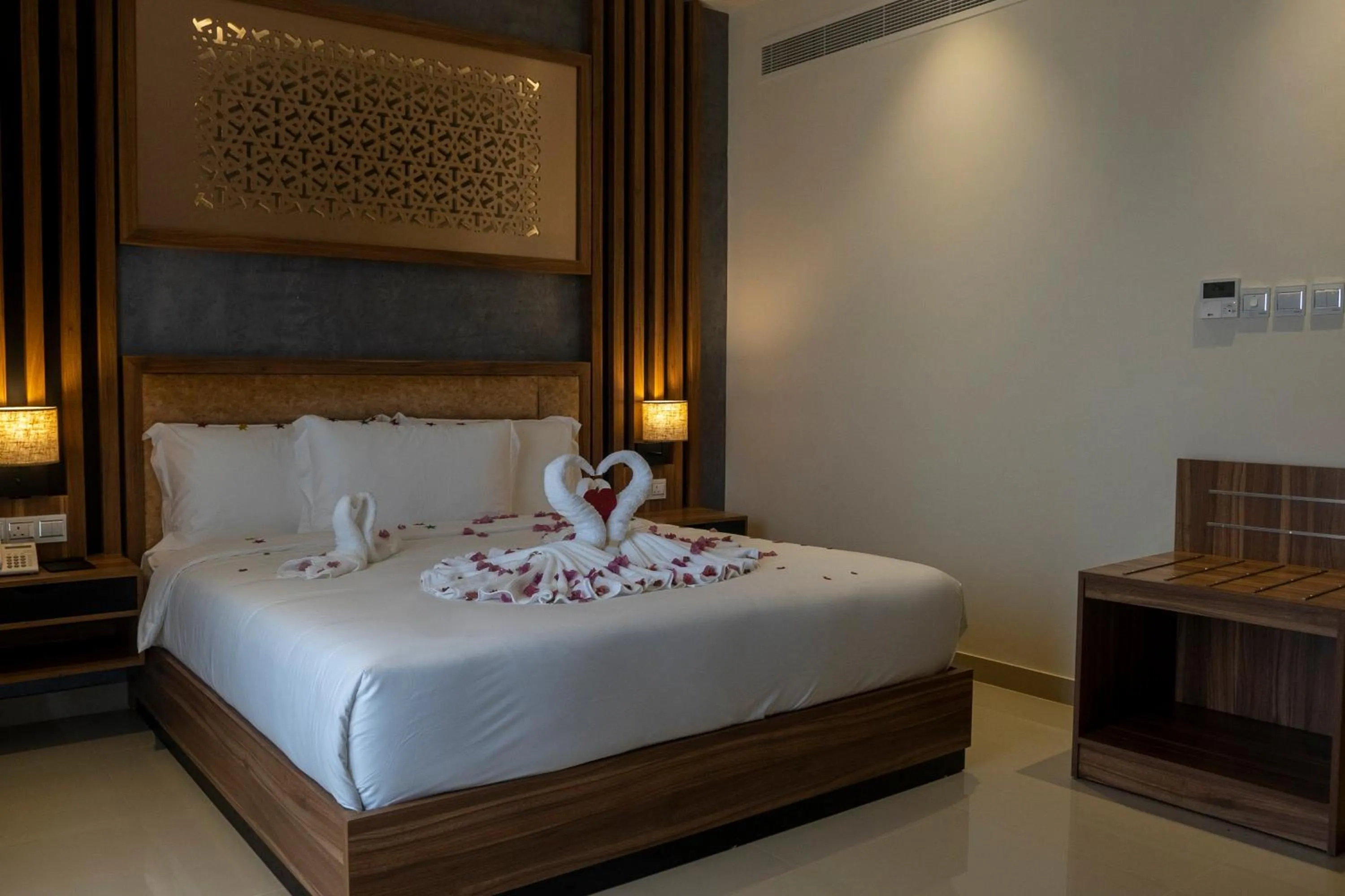 Bed in The Plaza Hotel & Resort